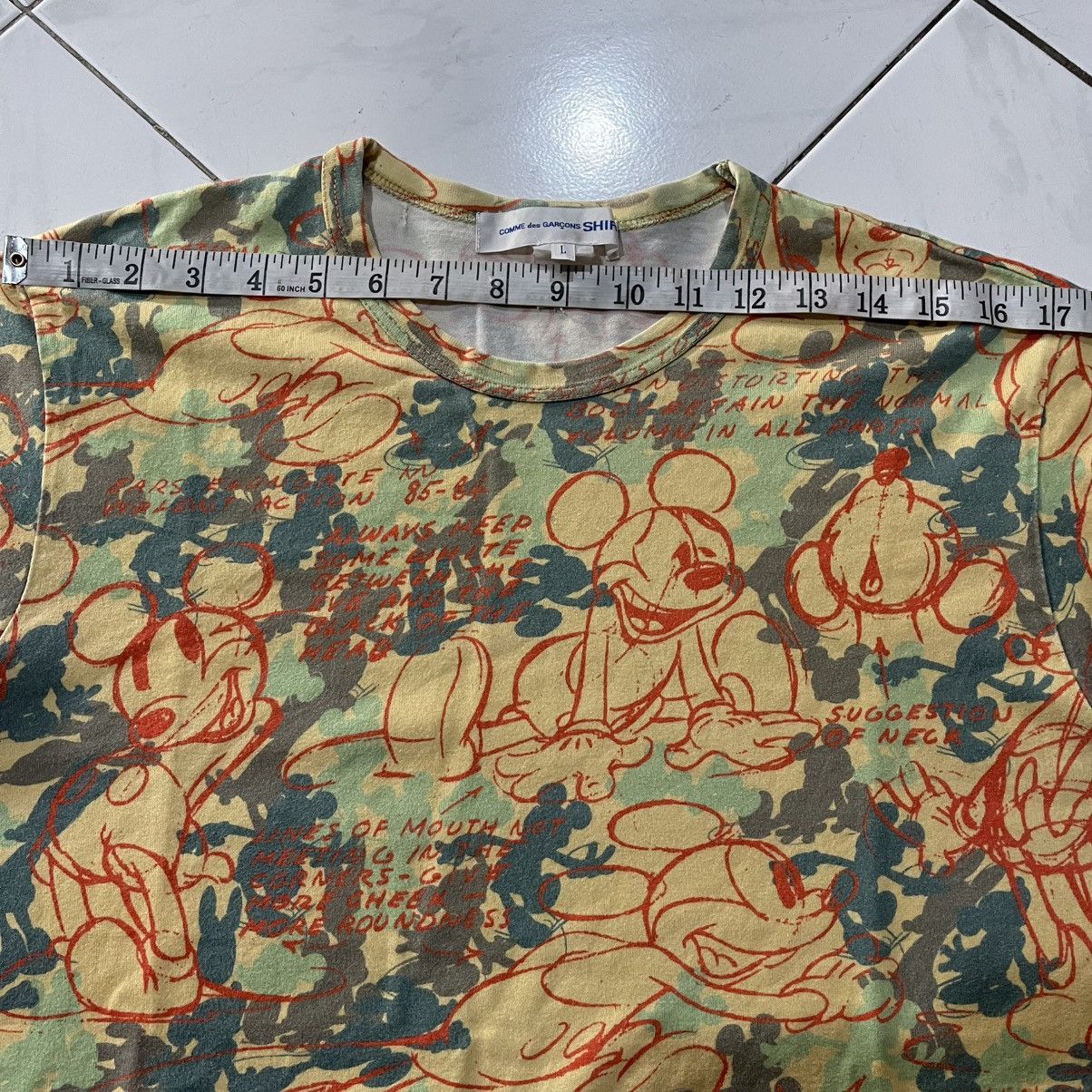 Comme des garcons disney all over print tee