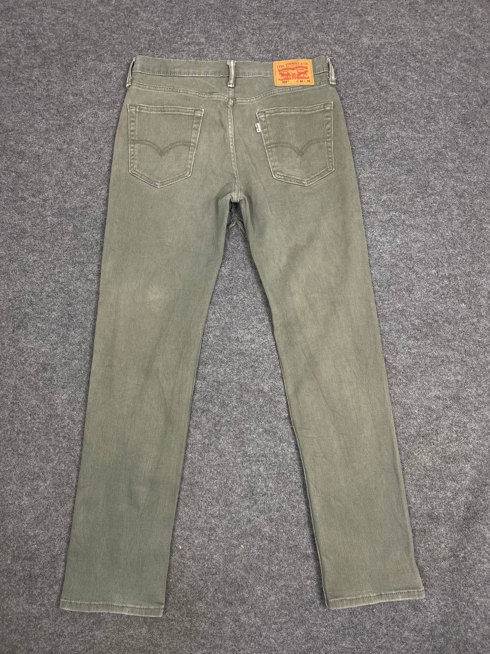 image of 514 Slim Straight Distressed Denim in Green, Men's (Size 33)