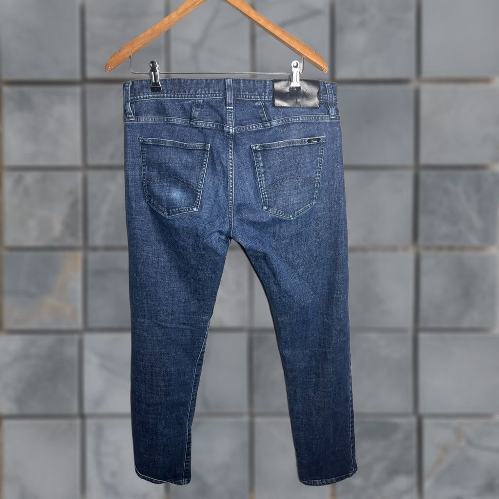 Armani Exchange Armani Exchange Jeans Slim Fit 5-Pocket Indigo Blue Size 33 Mens Denim Dark Blue 8NZJ13Z1SAZ55AA Size US 33 - 1 Thumbnail