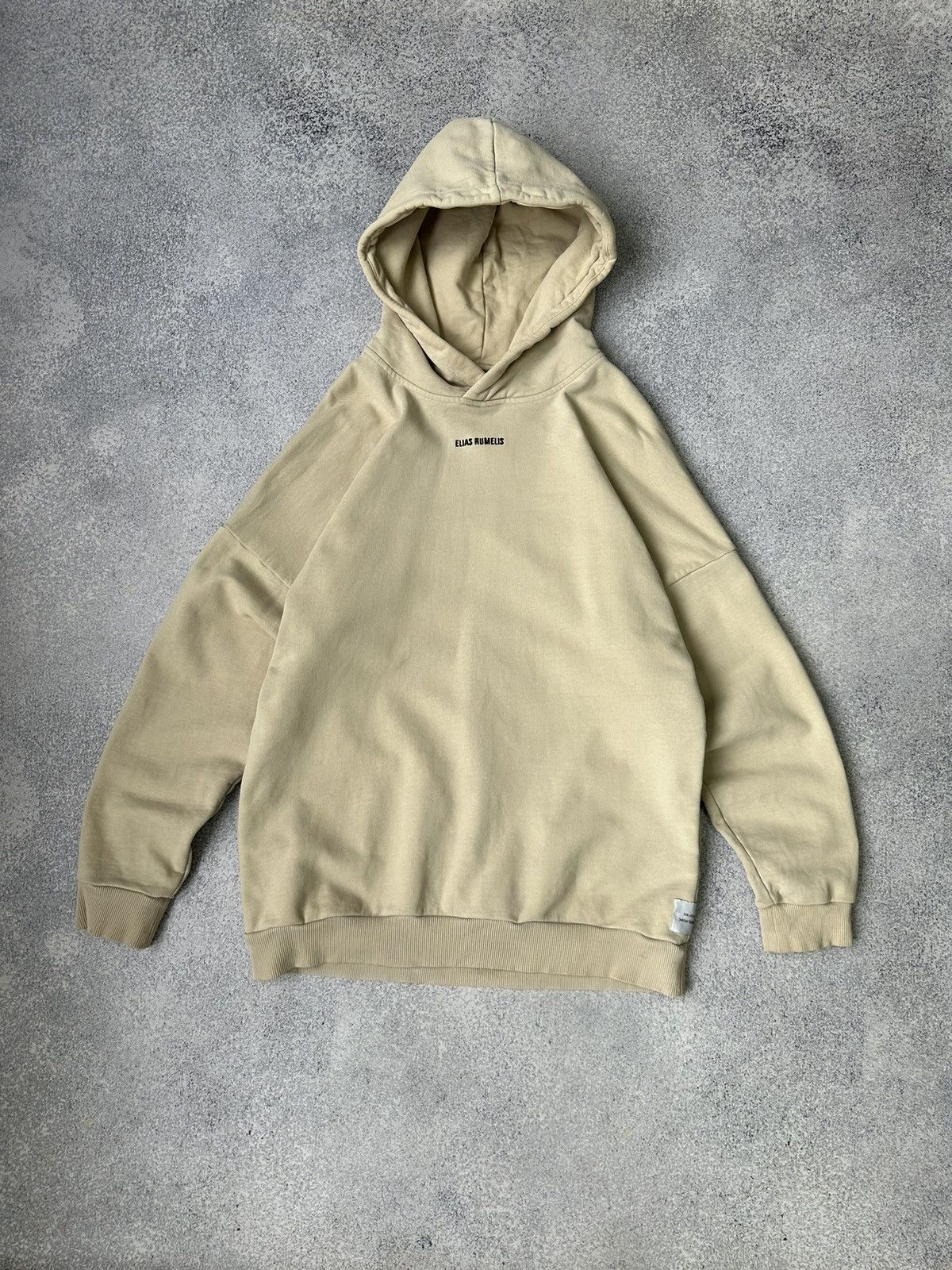 image of Vintage Elias Rumelis Er Willa Unisex Beige Heavy Hoodie, Men's (Size Medium)