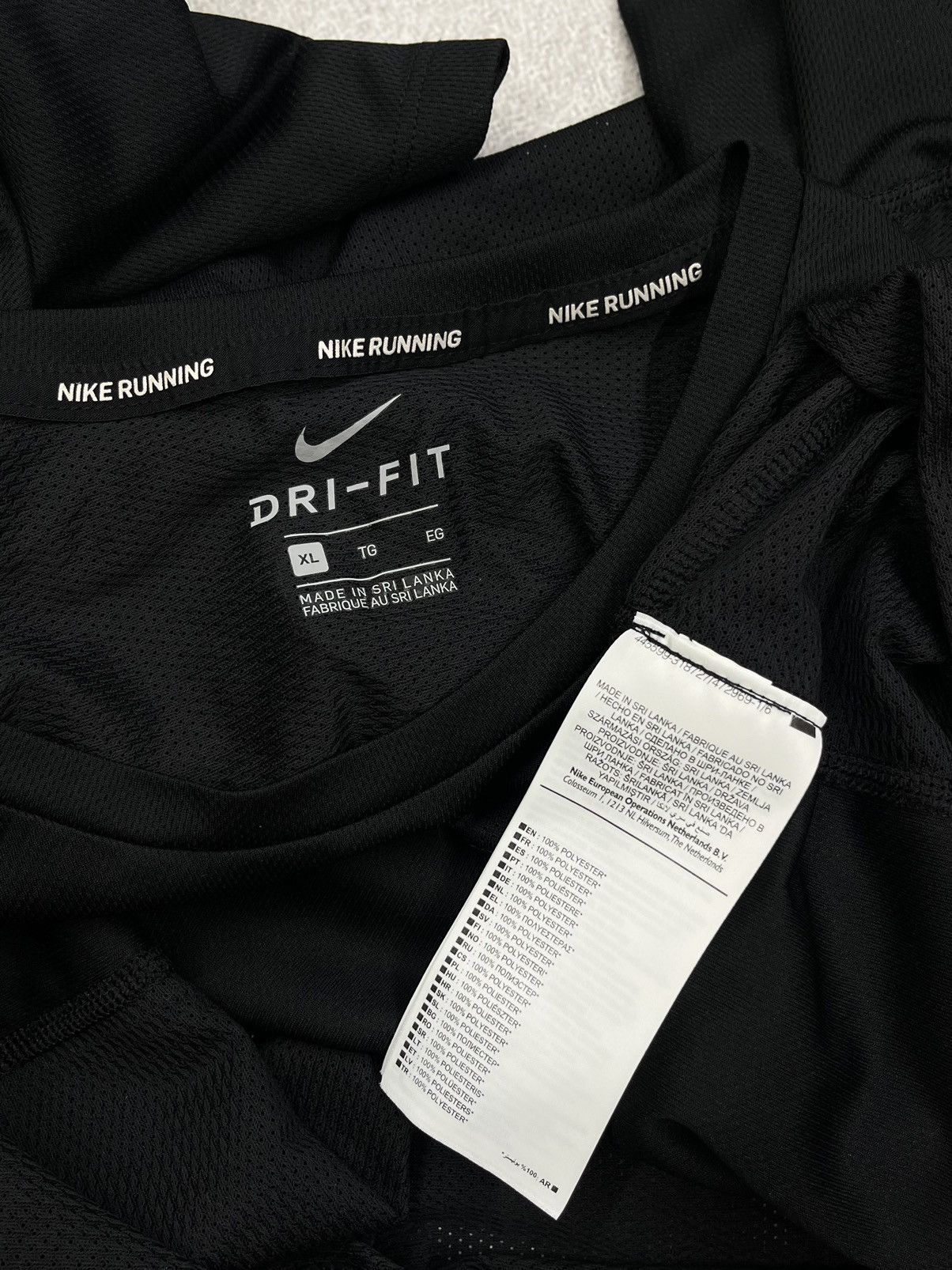 Nike Mens Nike Running Dri Fit Black T Shirts To The Grid Size US XL / EU 56 / 4 - 7 Thumbnail