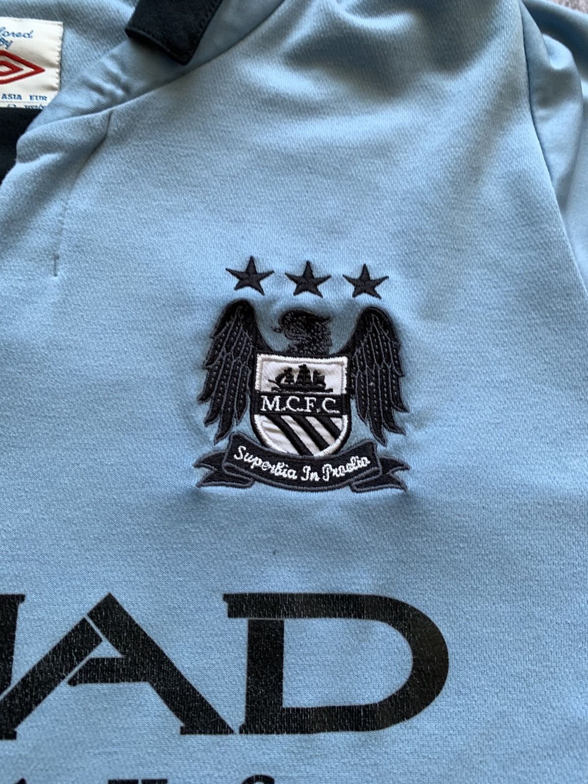 Umbro 🔥MANCHESTER CITY UMRO 2012/13 HOME JERSEY SINCLAIR UCL SHIRT Size US L / EU 52-54 / 3 - 10 Thumbnail