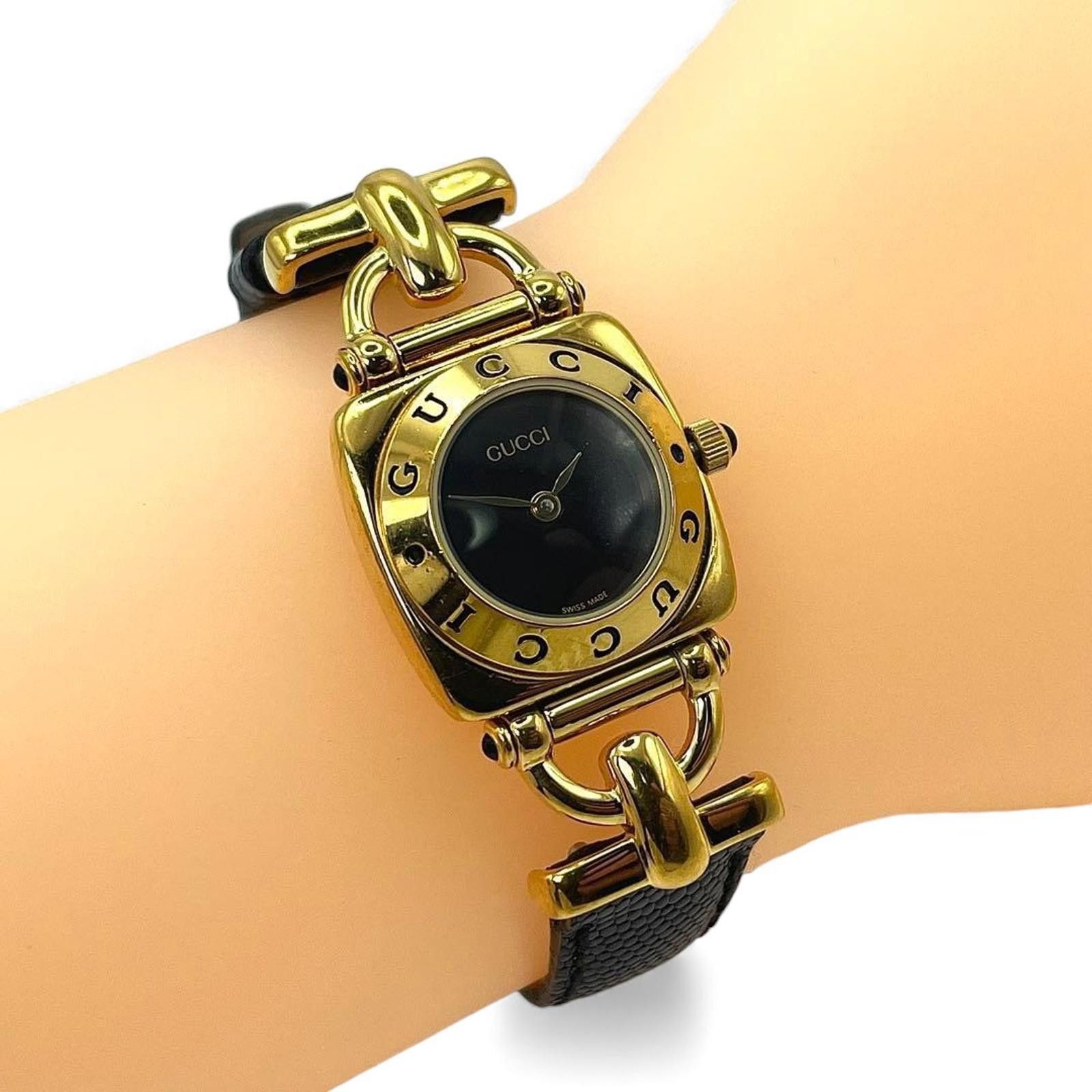 Gucci Gucci - Women's Gold Tone and Black Leather Wristwatch Size ONE SIZE - 2 Thumbnail