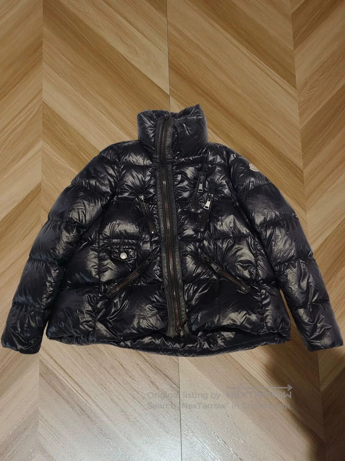 moncler black puffer jacket with stand collar.