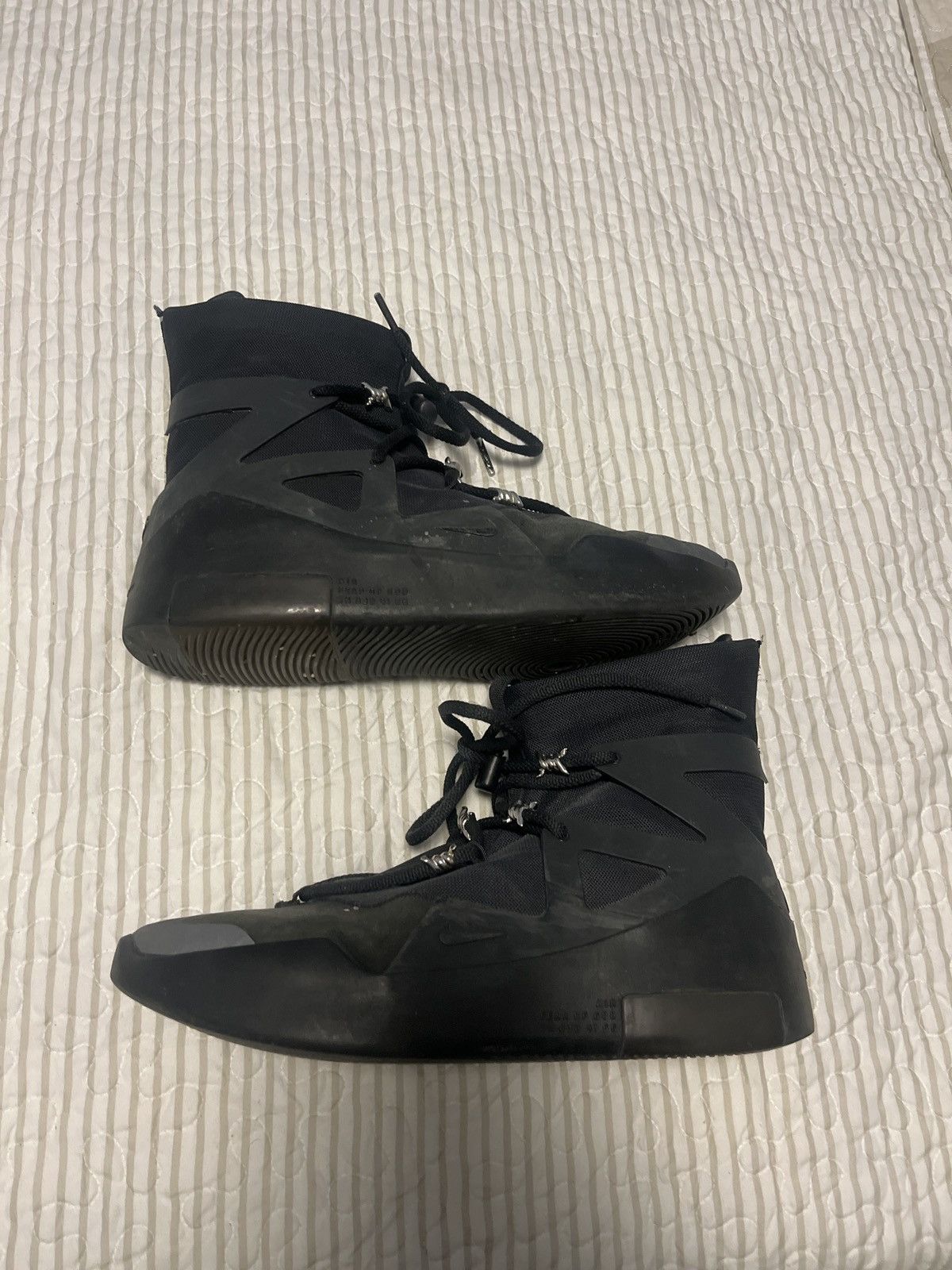 nike fear of god triple black on feet