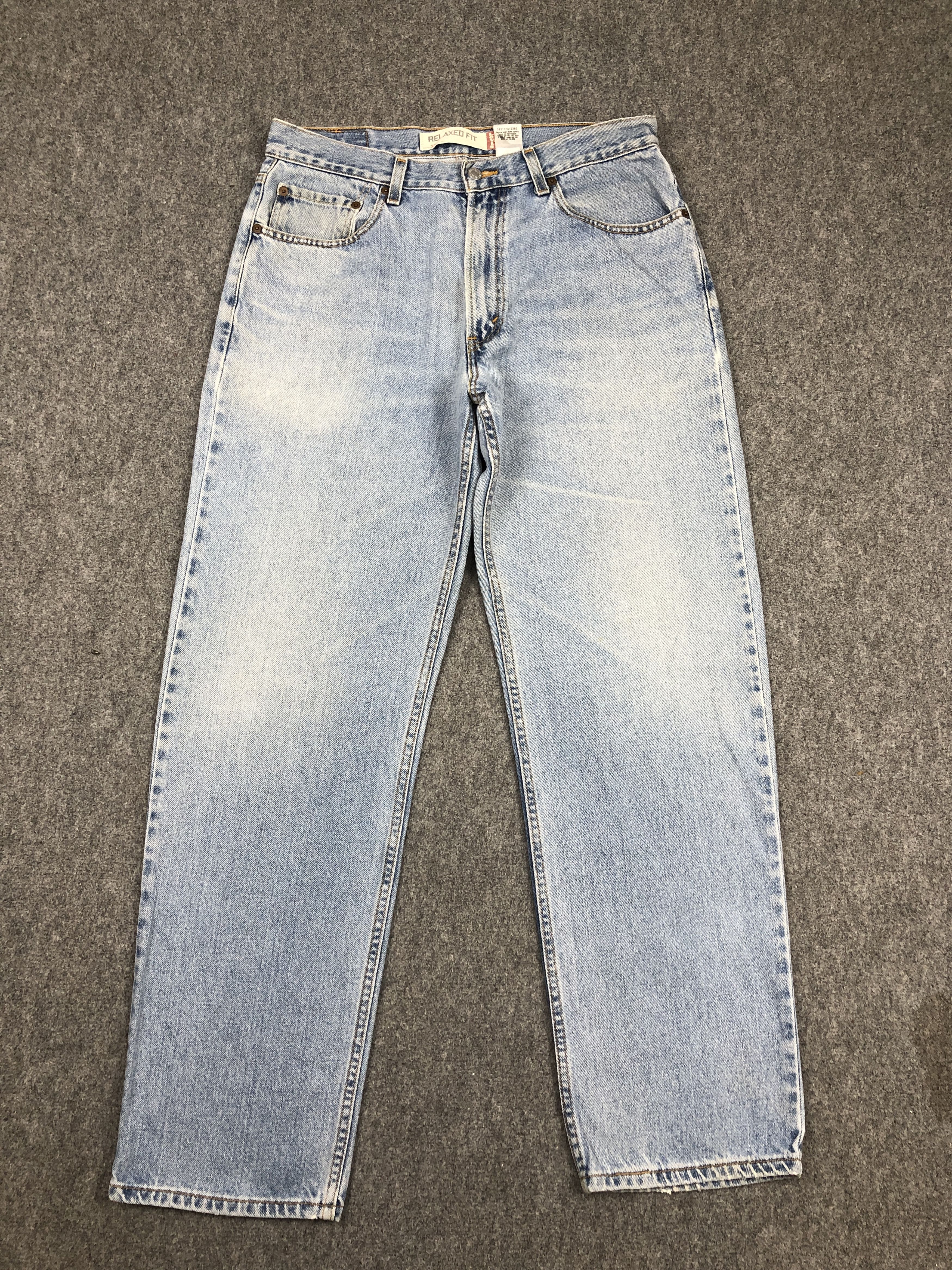 image of Faded Blue Vintage Levis 550 Jeans, Men's (Size 31)