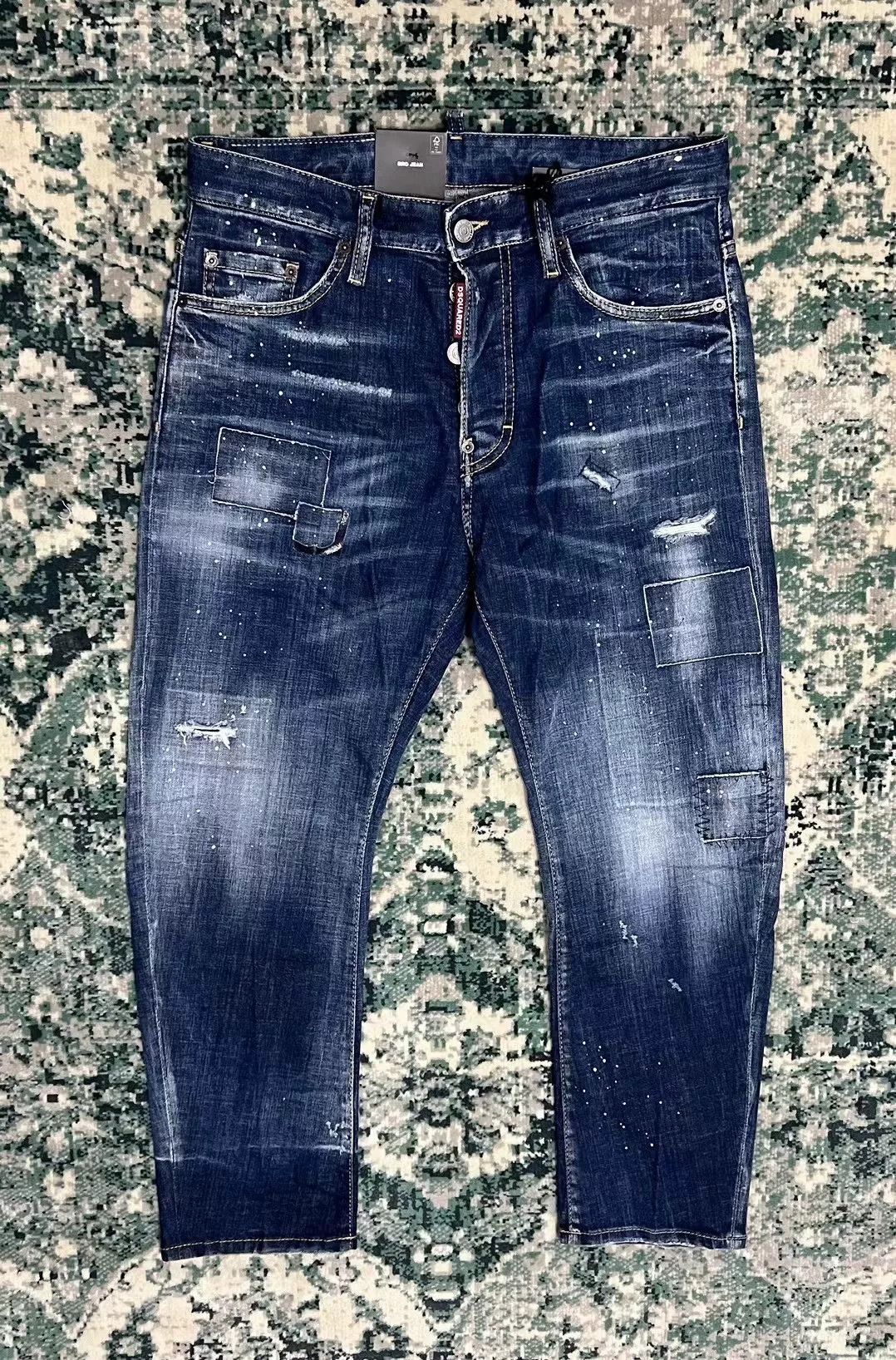blue distressed cropped denim trousers by dsquared2
