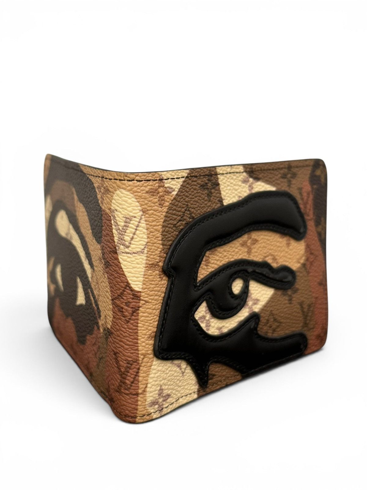 LOUIS VUITTON Brown Leather Eye Appliqué Bifold Wallet