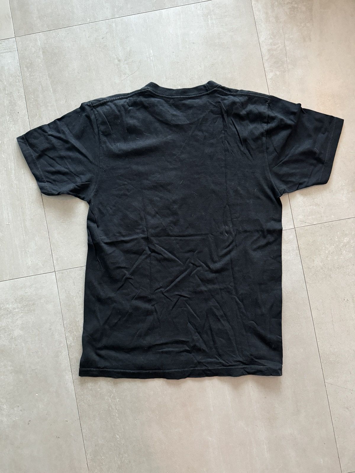 Supreme motion logo tee black on sale