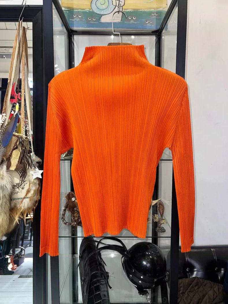 Issey Miyake Orange pleated long-sleeved shirt