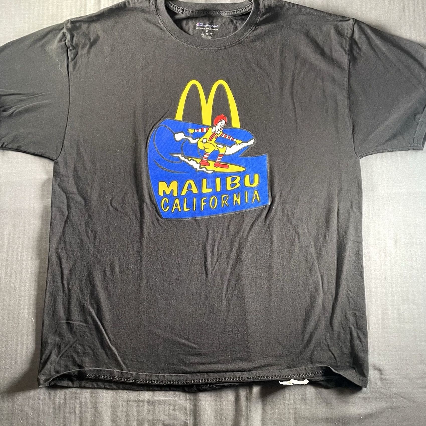 Champion Champion Tee Men’s XL Black California Surf Ronald McDonald Malibu California Tee (Men’s XL) Size US XL / EU 56 / 4 - 5 Thumbnail