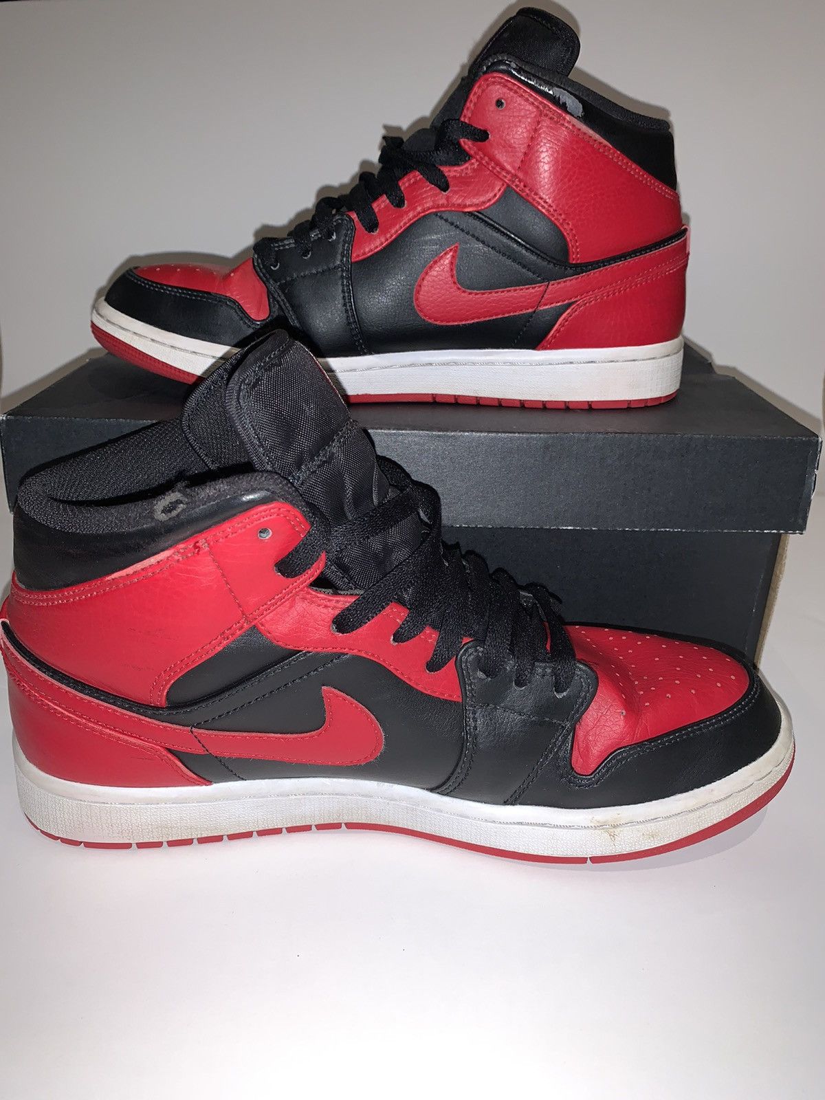 image of Air Jordan Retro 1 “Banned” Mids Shoes in Red, Men's (Size 10)