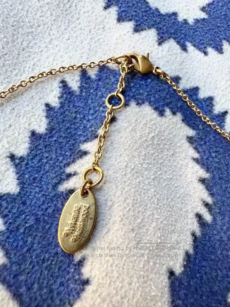 Vivienne Westwood Vivienne Westwood Mother of Pearl Saturn Necklace. Size ONE SIZE - 6 Thumbnail