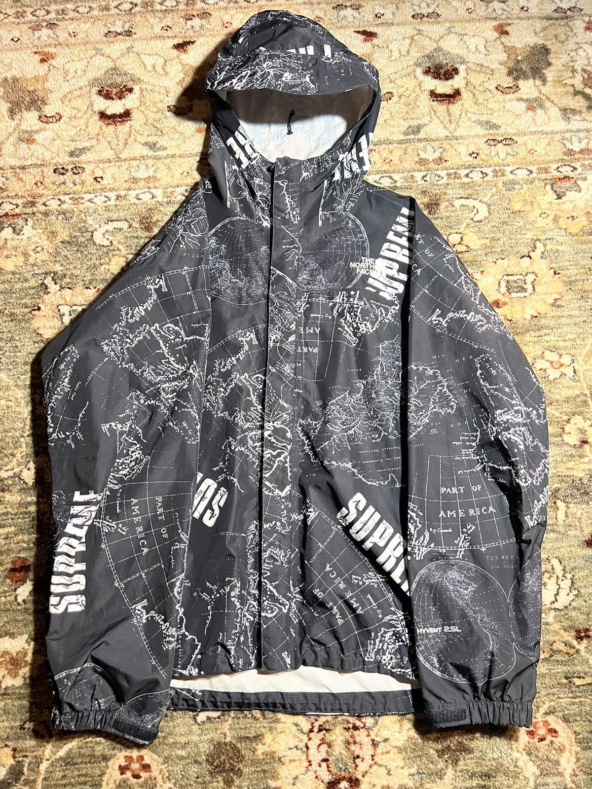 image of Supreme Tnf Map Raincoat in Black, Men's (Size Large)