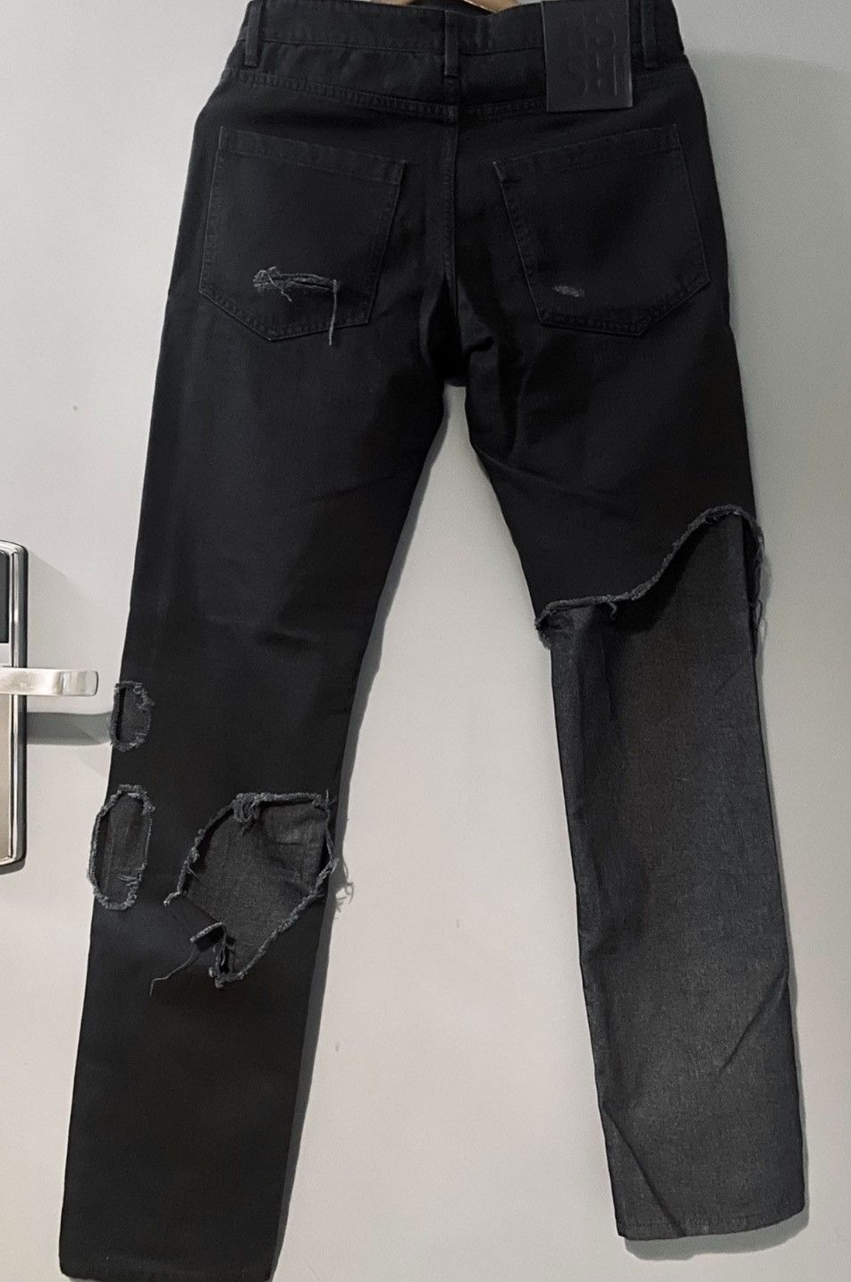 パンツ RAFSIMONS 23SS DESTROYED DENIM PANTS Raf Simons Destroyed Denim Pants in Black | FWRD