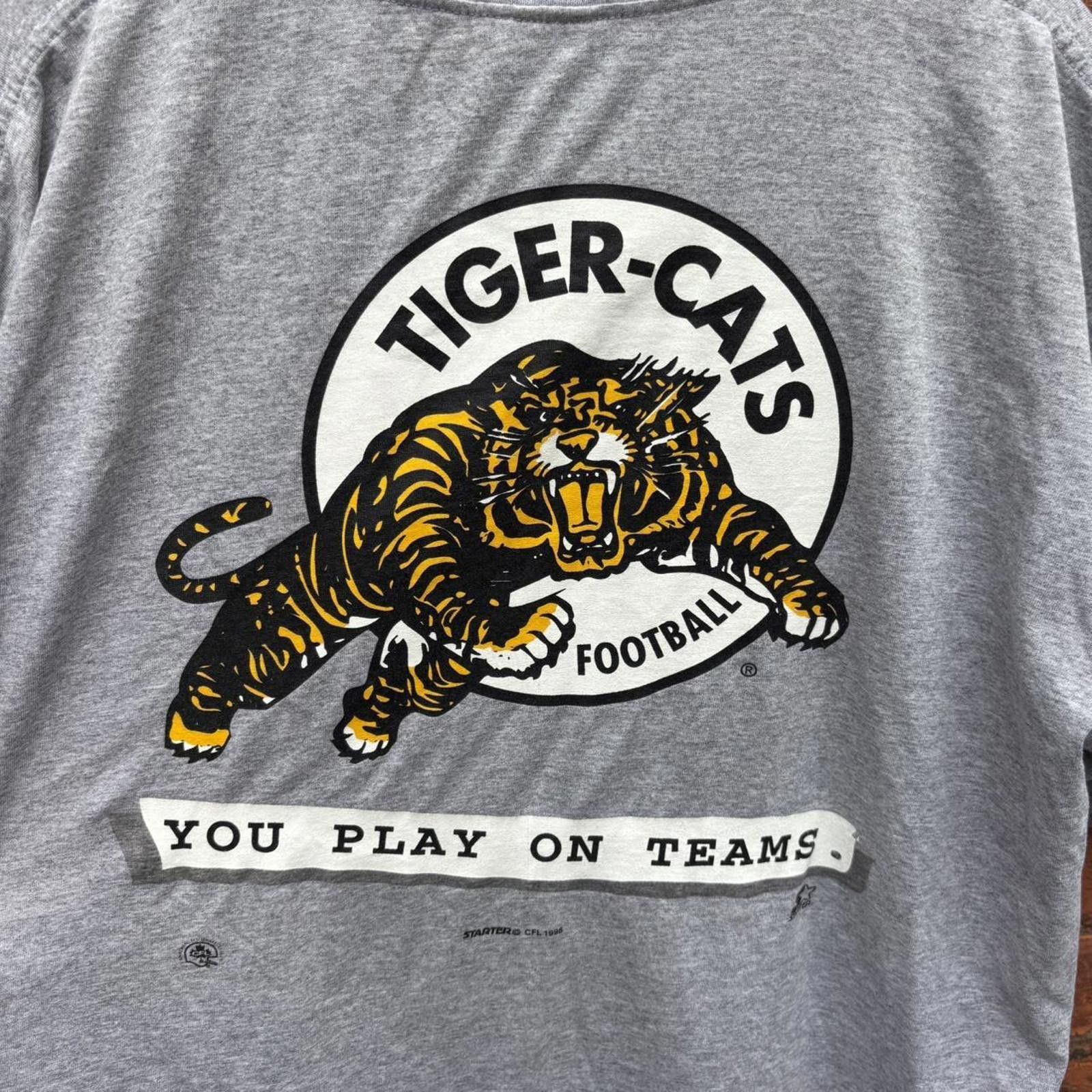 Starter Vintage Hamilton tiger cats starter t shirt 1995 RARE L/XL Size US L / EU 52-54 / 3 - 4 Thumbnail