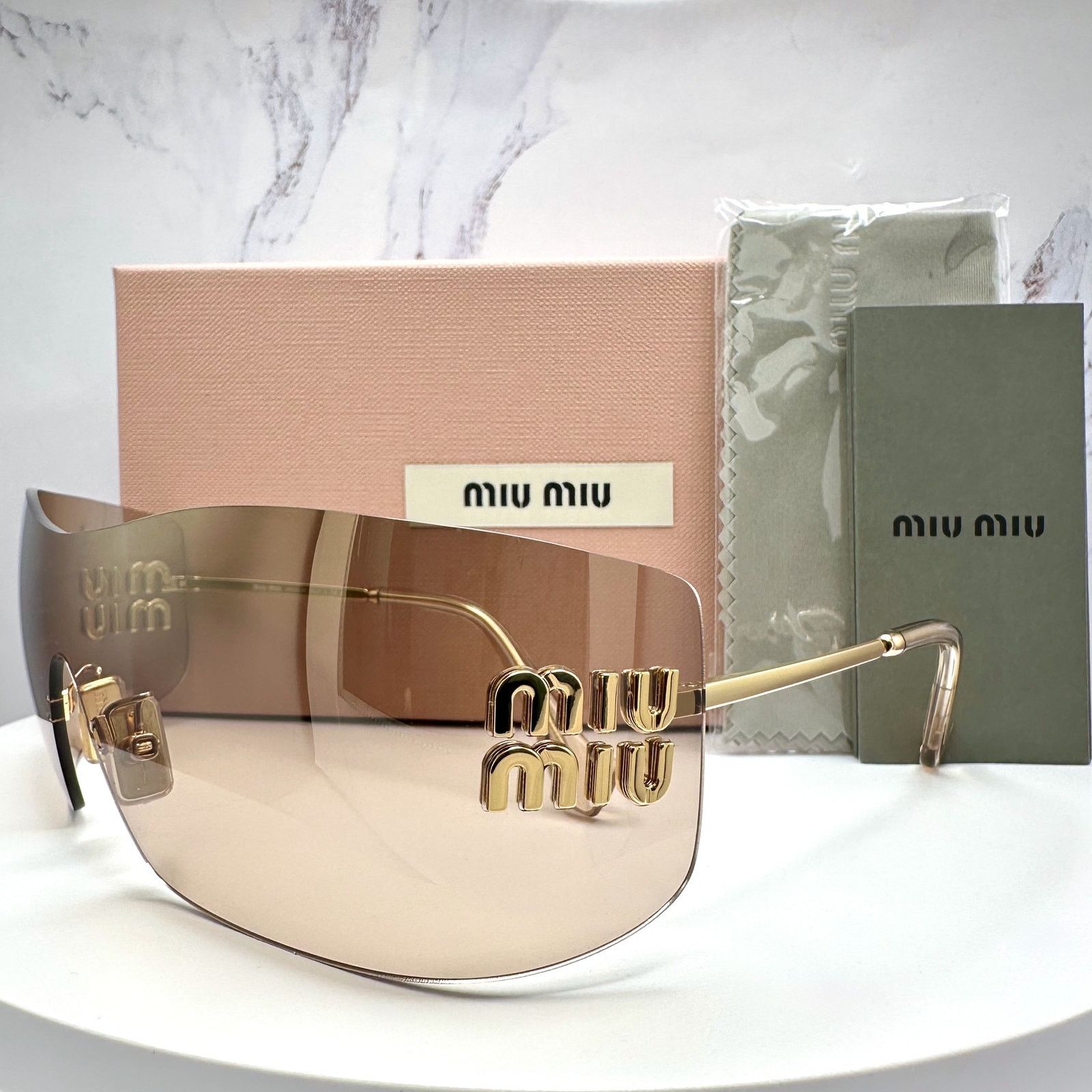 Miu Miu New MIU MIU Sunglasses Gold Light Mirror Bronze Rimless Wrap Size ONE SIZE - 1 Thumbnail