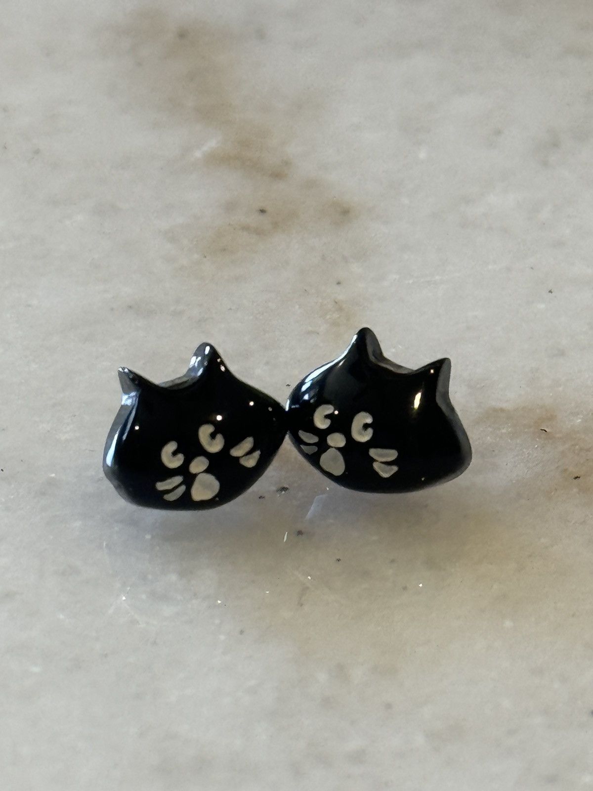 image of Issey Miyake x Ne Net Ne-Net Cat Earrings in Black, Men's