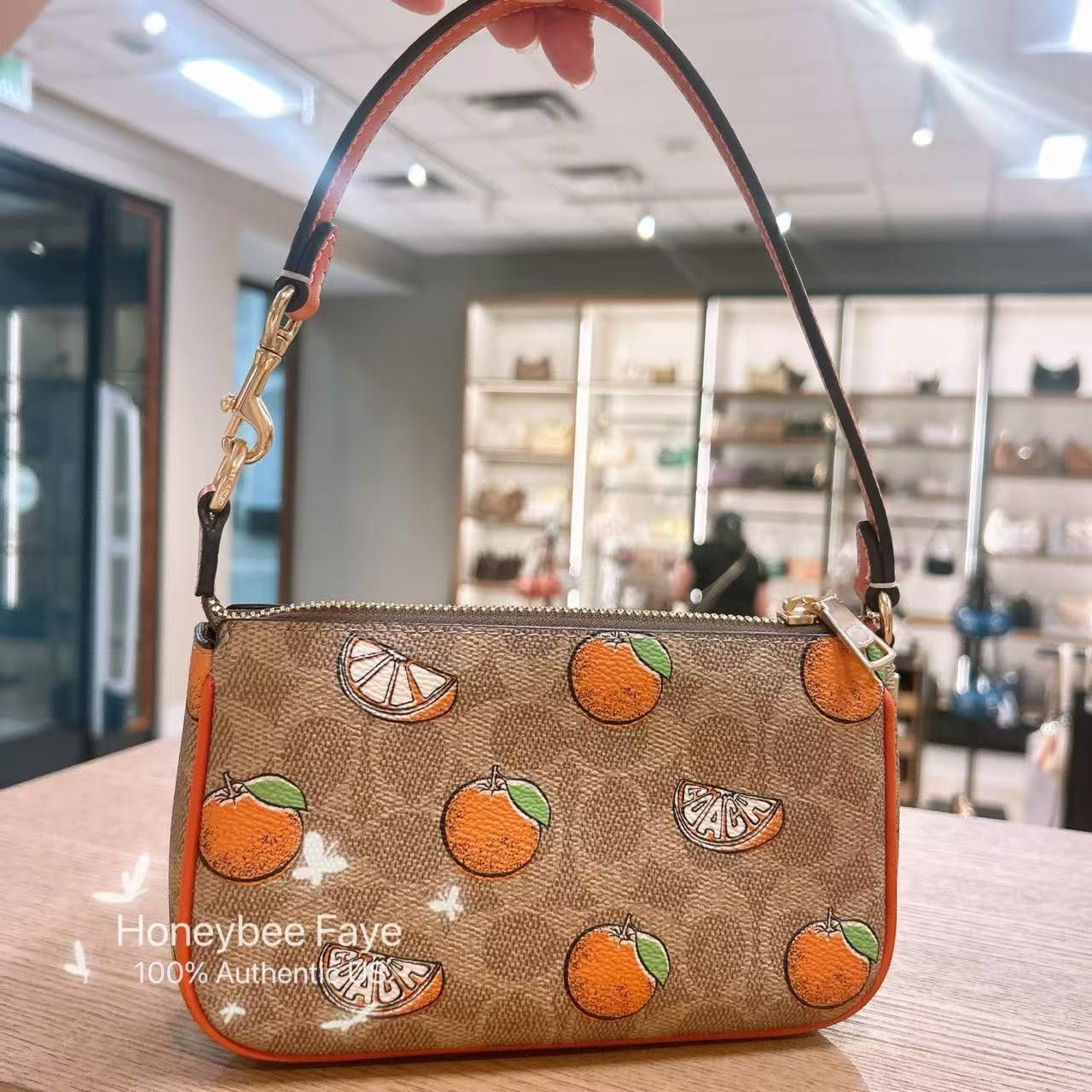 【COACH】Nolita 19 In Signature Canvas/オレンジ COACH® Outlet | Nolita 19 In Signature Canvas