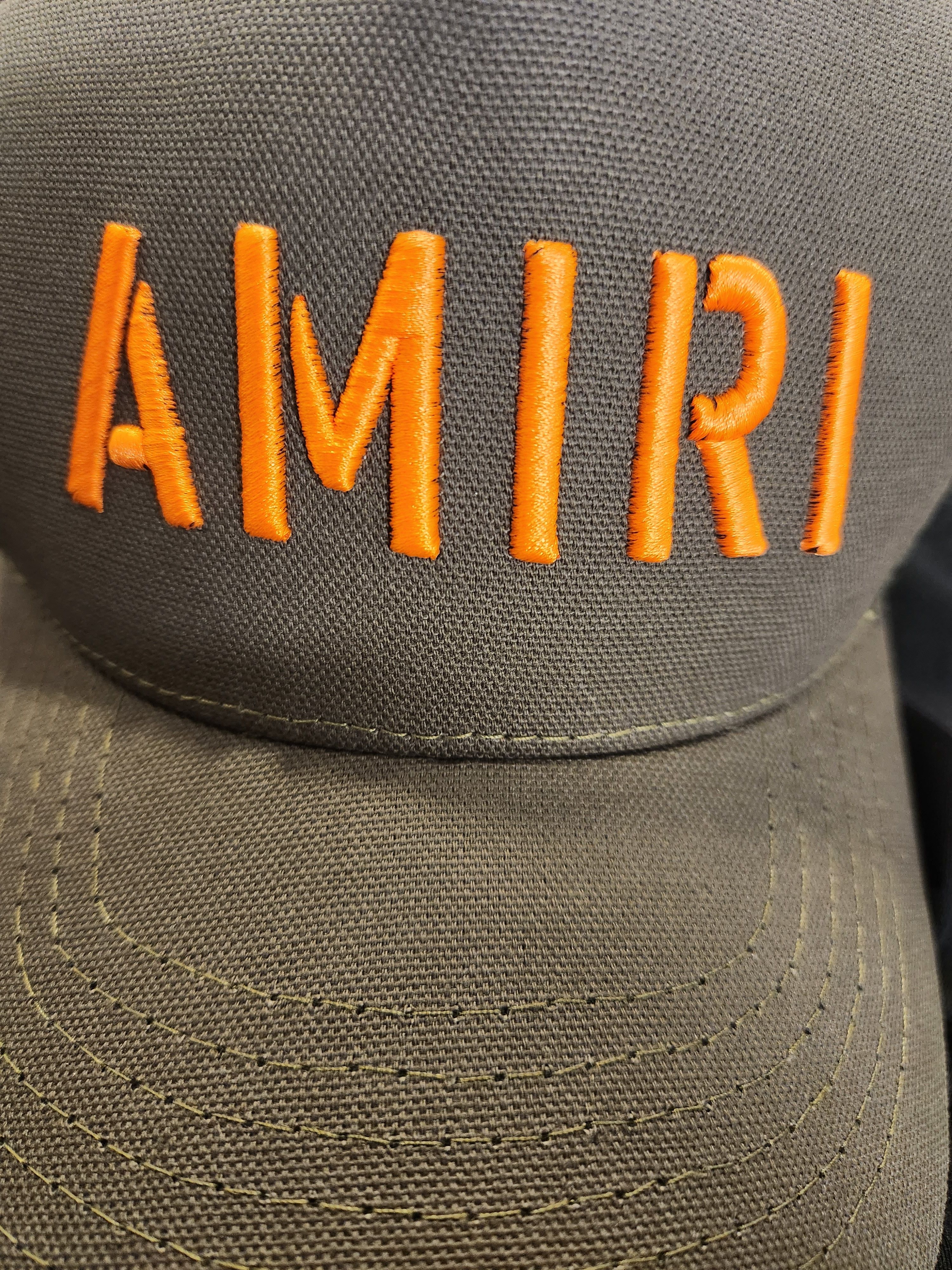 Amiri AMIRI olive green/orange stencil camo trucker hat Size ONE SIZE - 9 Thumbnail