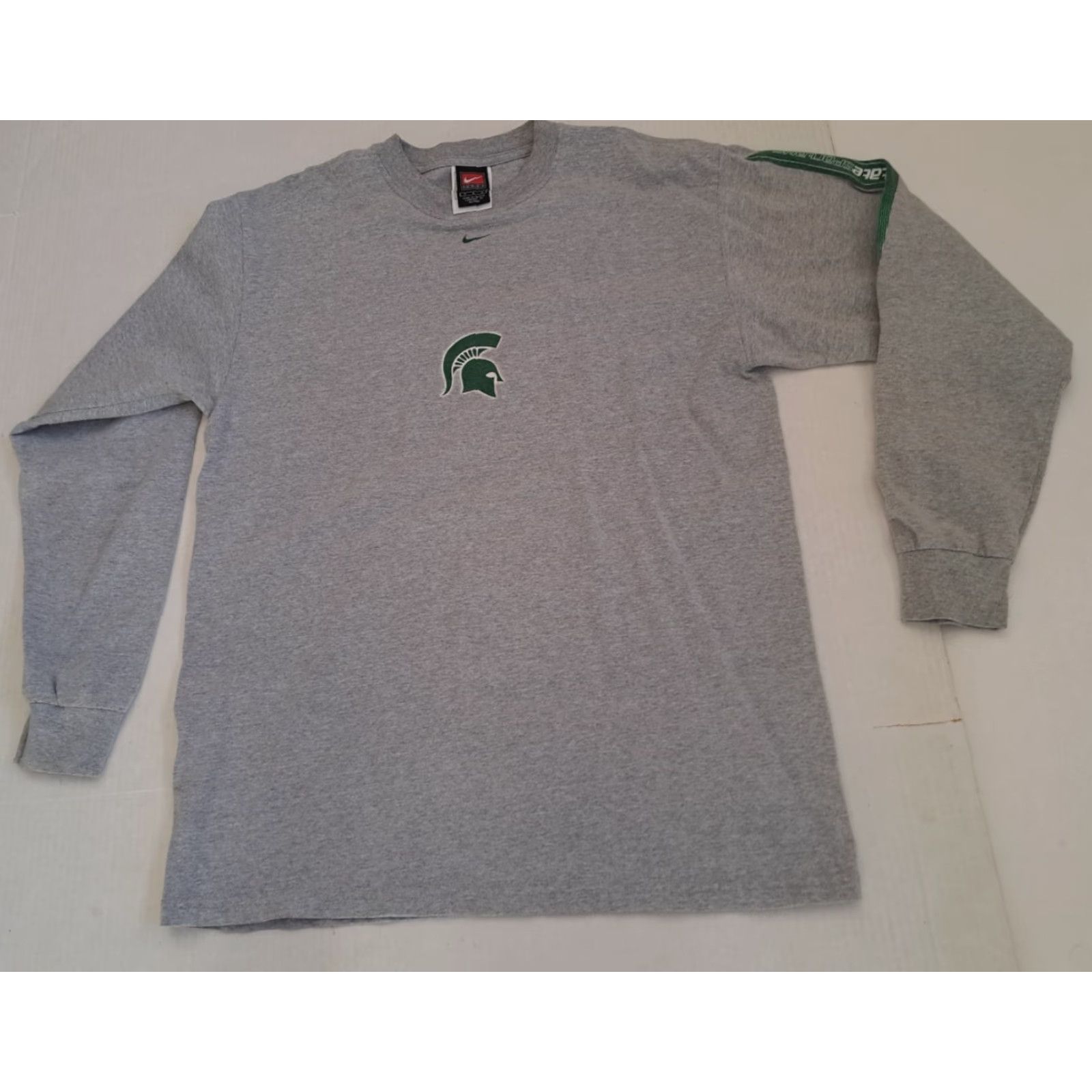 Nike **90s Michigan State U. Printed Nike Gray Crew Neck T-Shirt Med** User: VINTAGE Michigan State U. Printed Nike Gray Crew Neck T-Shirt Med 90s **M** Size US M / EU 48-50 / 2 - 4 Thumbnail