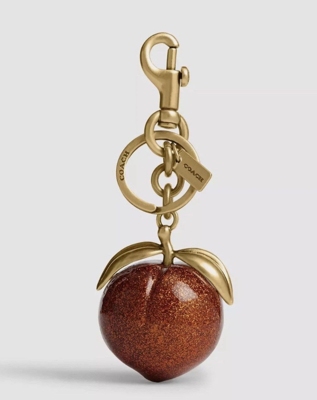 Coach The Summer I Turned Pretty Peach Bag Charm CBX51 Size ONE SIZE - 1 Thumbnail