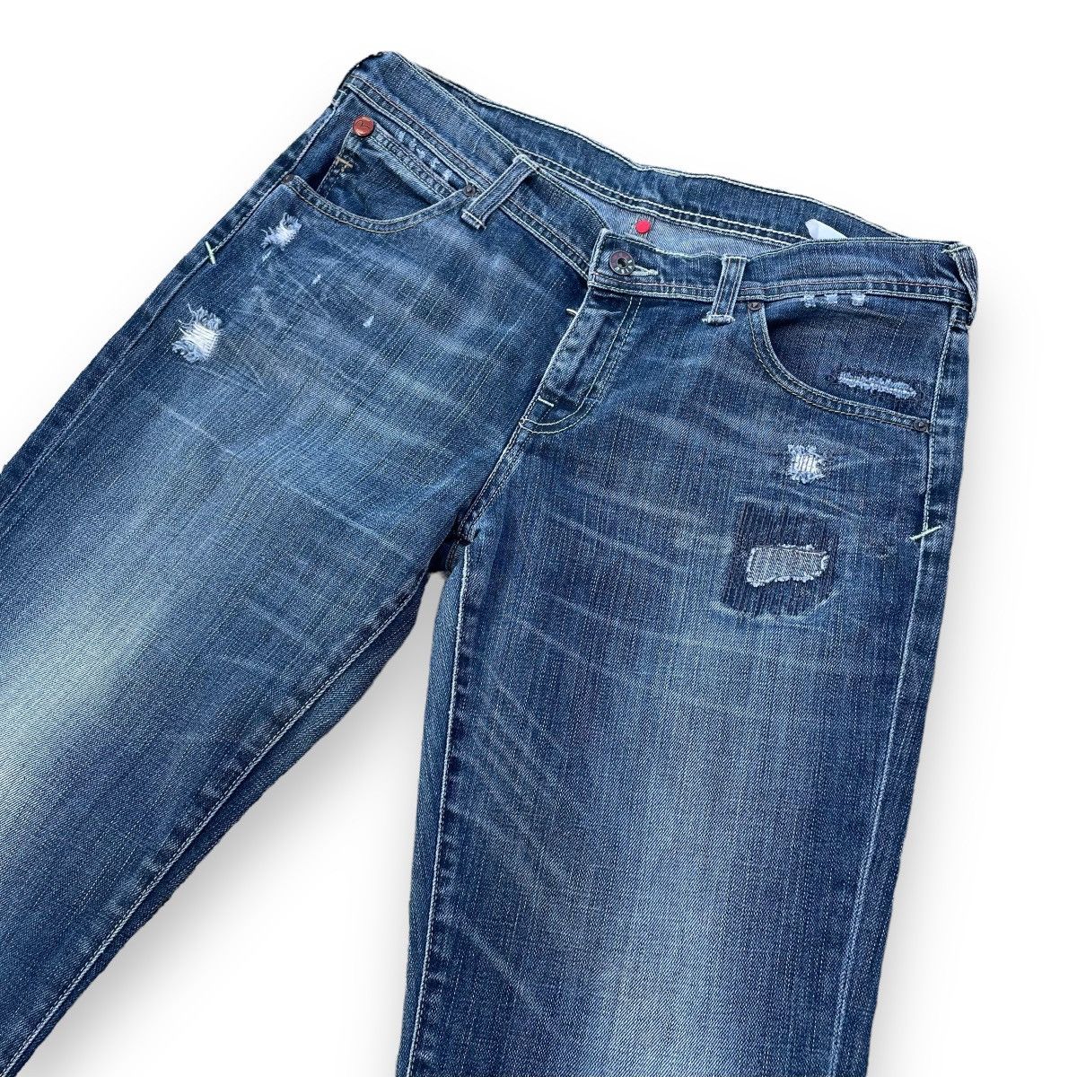 VINTAGE Y2K EVISU X PUMA DISTRESSED WASHED DENIM PANTS
