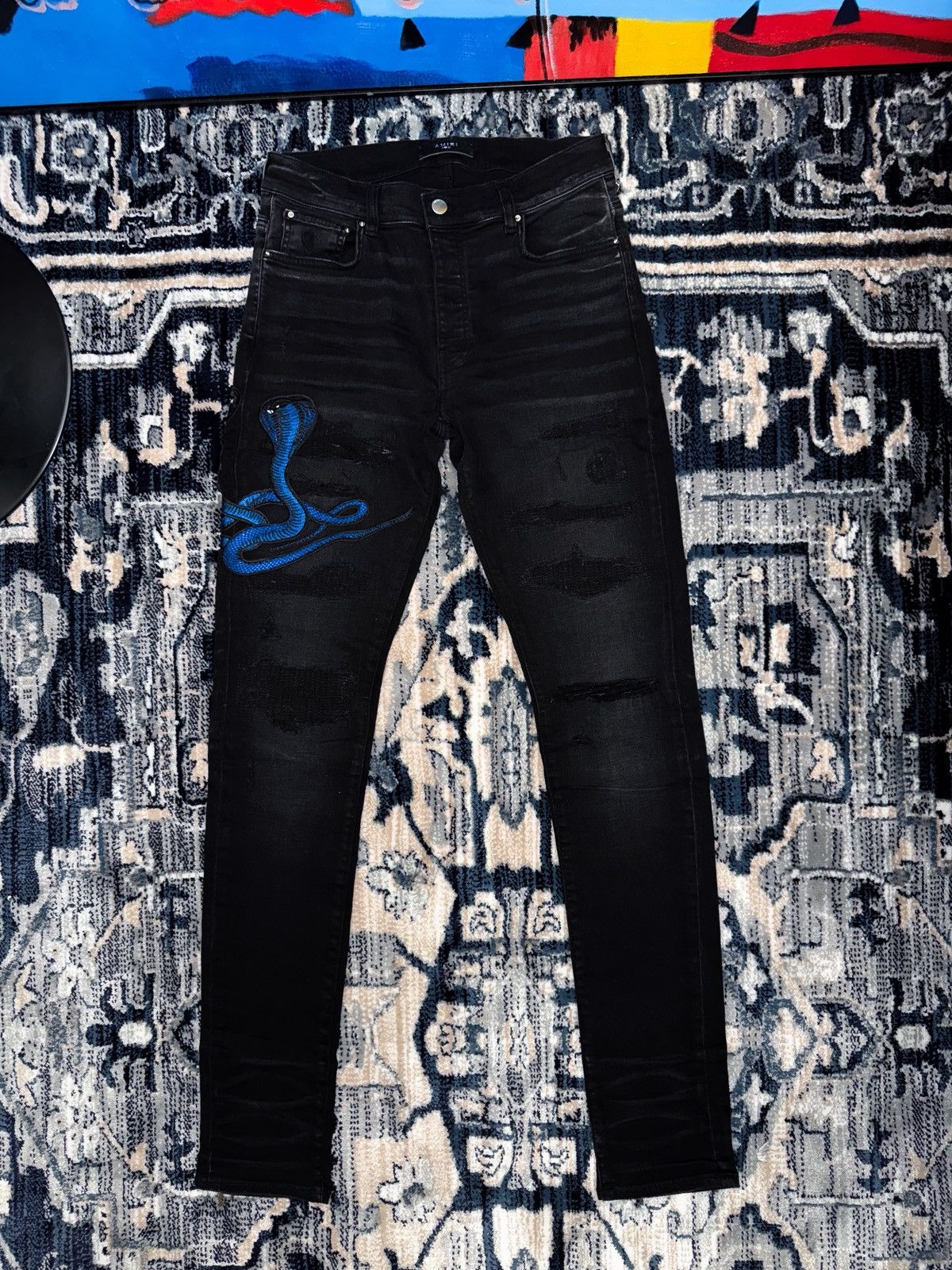Amiri snake embroidered jeans