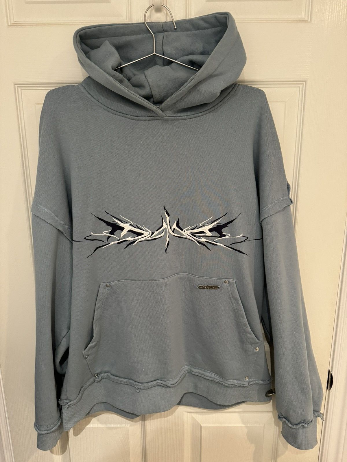 image of Y2K Streetwear Tribal Logo Hoodie in Light Blue, Men's (Size XL)