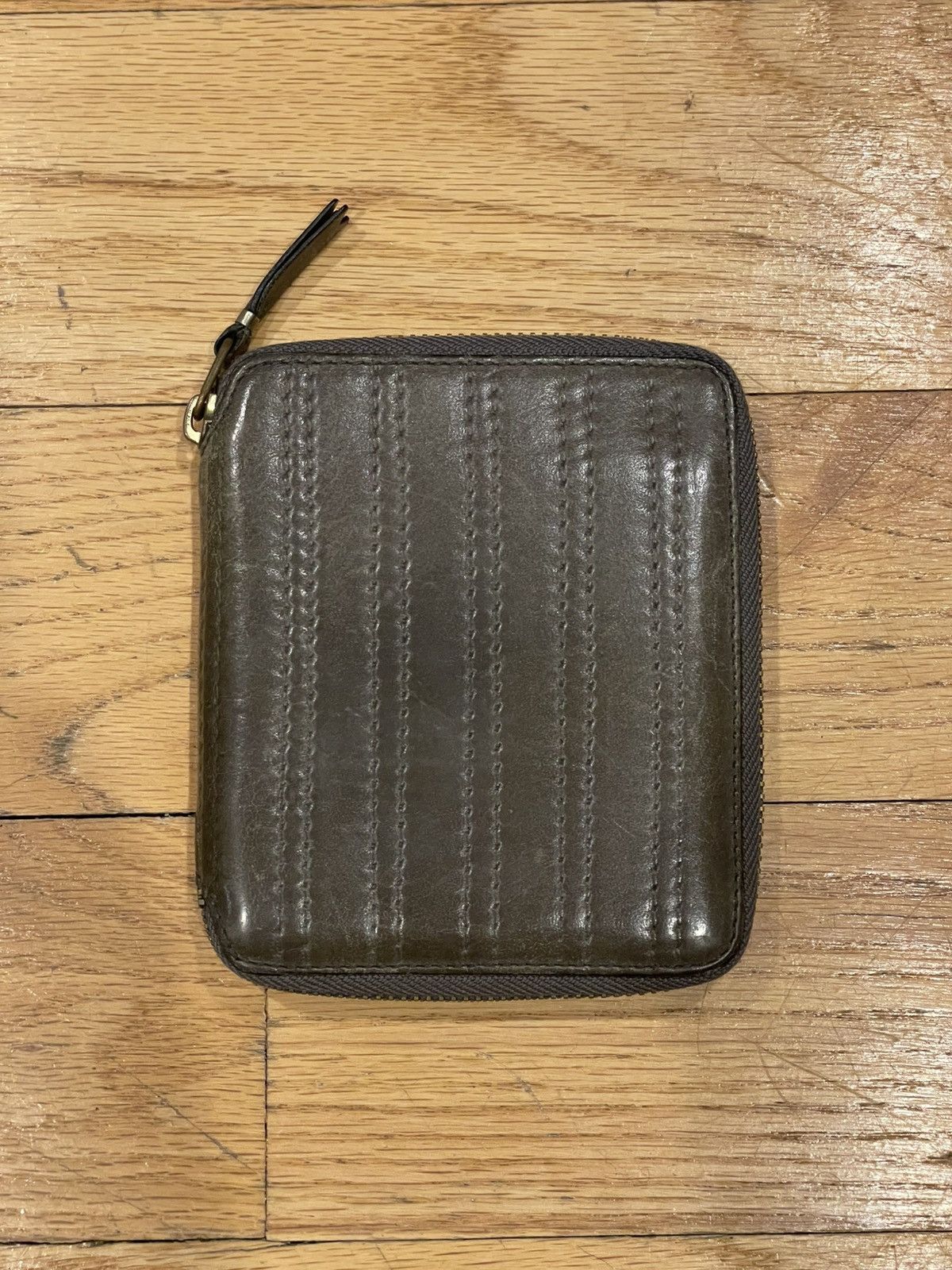 CDG stitched leather wallet
