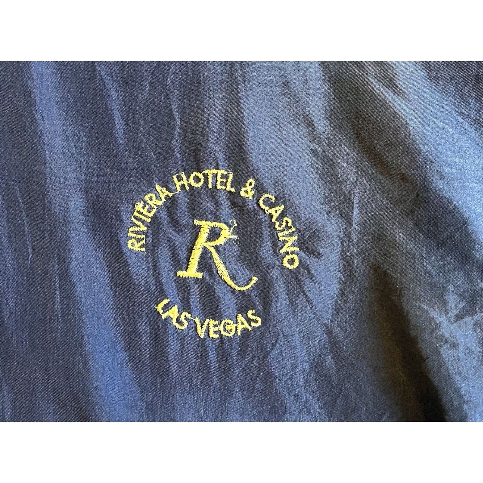Rivieras VINTAGE Riviera Hotel & Casino Silk Jacket Men’s Large Blue Bomber Jacket Short Chest 48 in Embroidered AUGIE Mens 80s City Retro Money Size US L / EU 52-54 / 3 - 3 Thumbnail