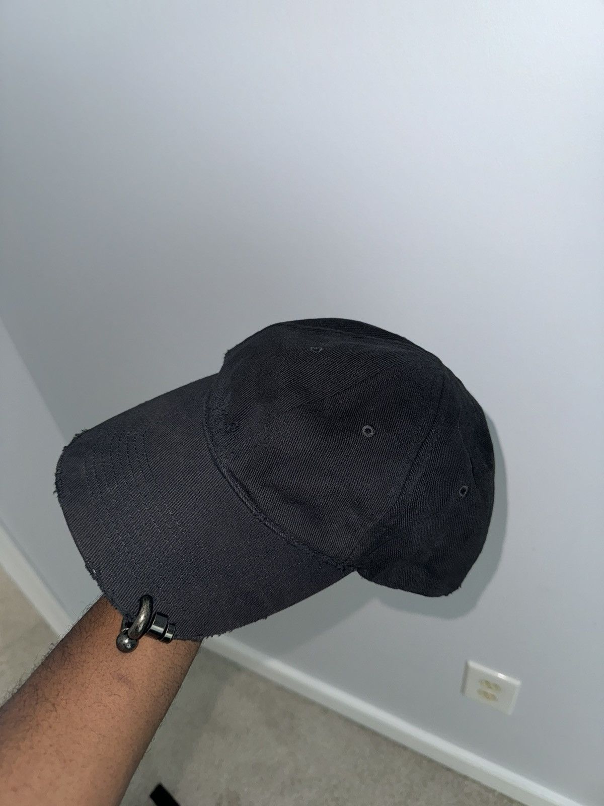 image of Balenciaga Heavy Piercing Cap in Black, Men's