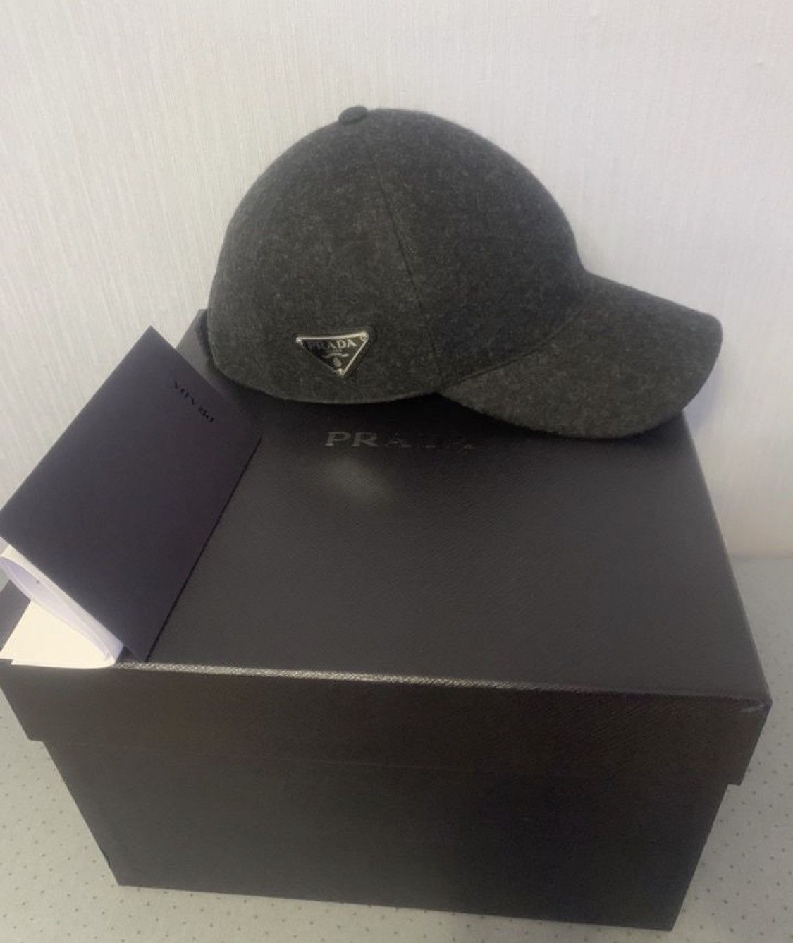 image of Prada Wool Cozy Logo Patch Detail Cap in Black, Men's