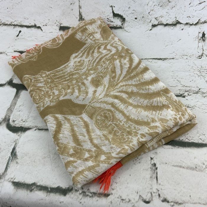 Vintage scarf with fringe details, symbolizing the intricate and layered textures found in minor key fringe performances