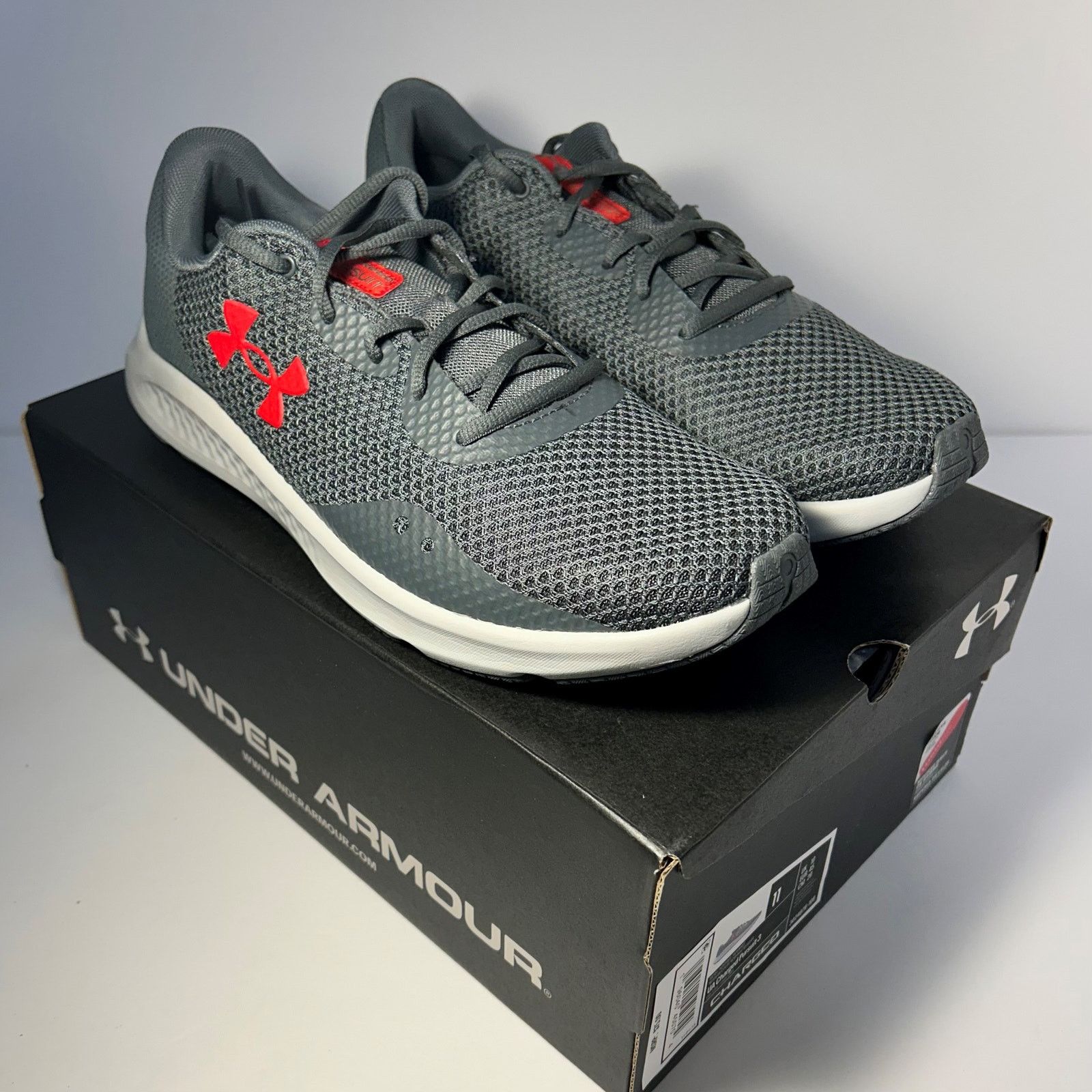 Under Armour Under Armour Charged Pursuit 3 Size 11 Gray/Red 3024878-108 Size US 11 / EU 44 - 1 Thumbnail