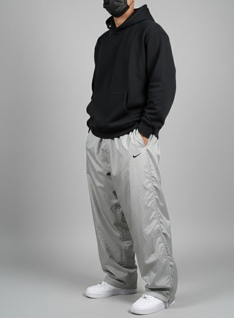 Vintage VINTAGE NIKE 90S BAGGY NYLON WIDE LEG SWOOSH TRACK PANTS Y2K Size US 30 / EU 46 - 1 Thumbnail