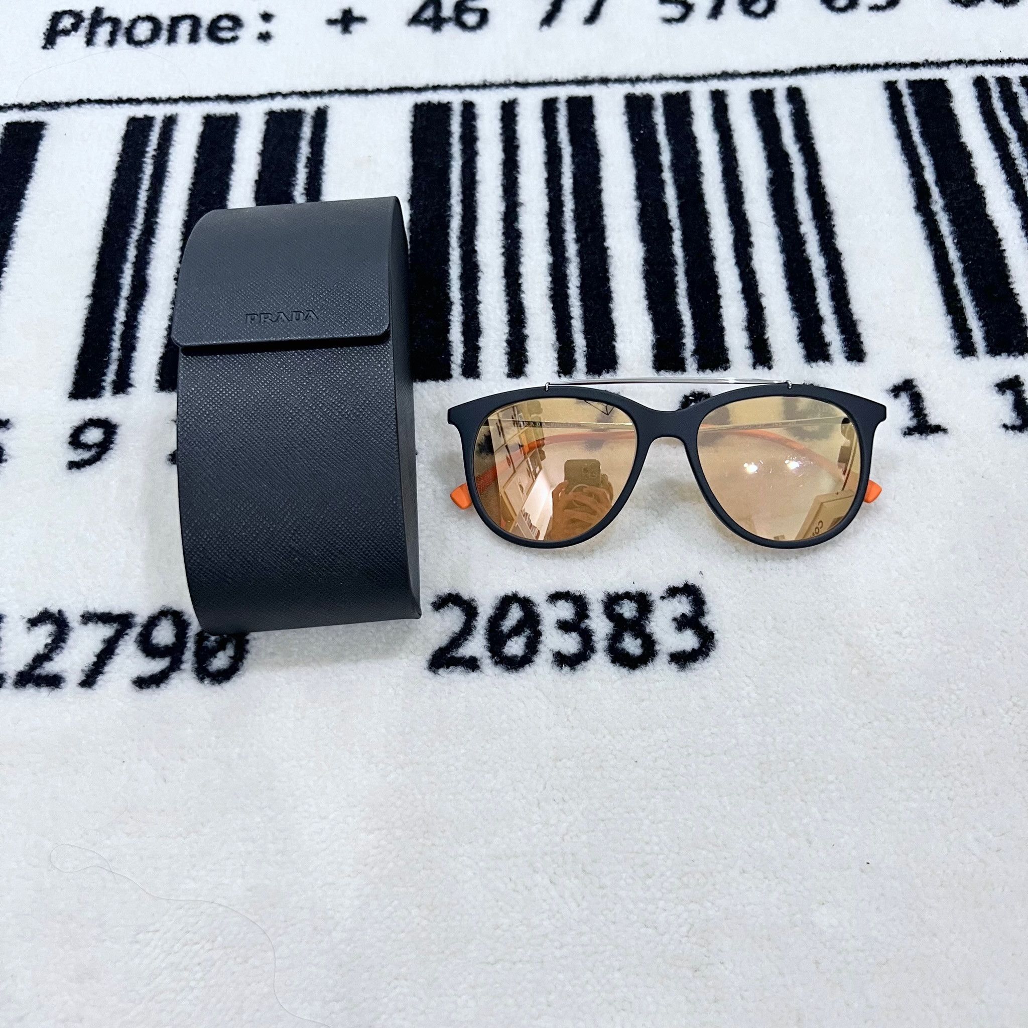 image of Prada Linea Rossa Black Frame Orange Mirror Lenses Sps02T in Black Orange, Men's