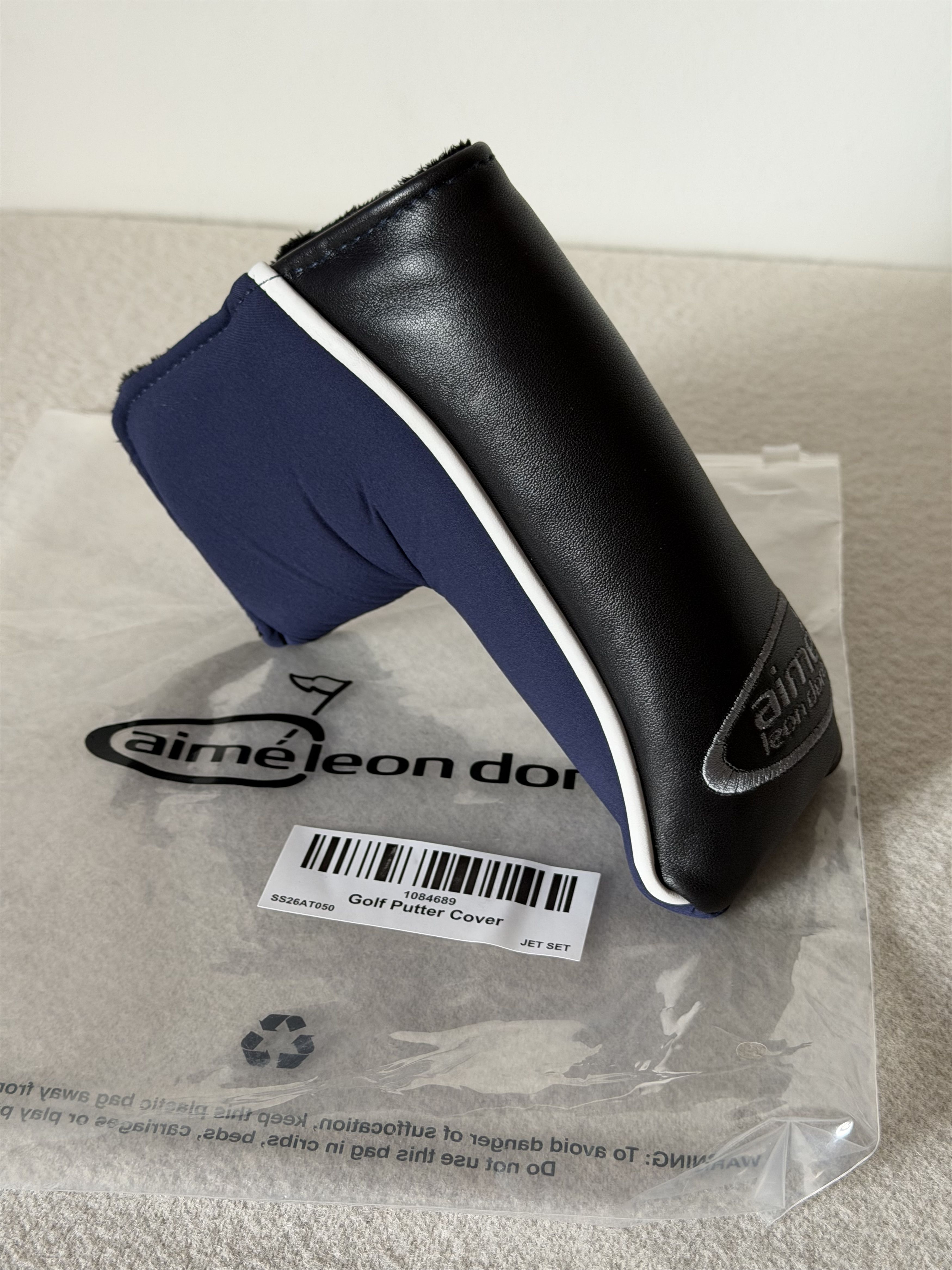 Aime Leon Dore Aime Leon Dore Golf Putter Cover in Navy Black Size ONE SIZE - 1 Thumbnail
