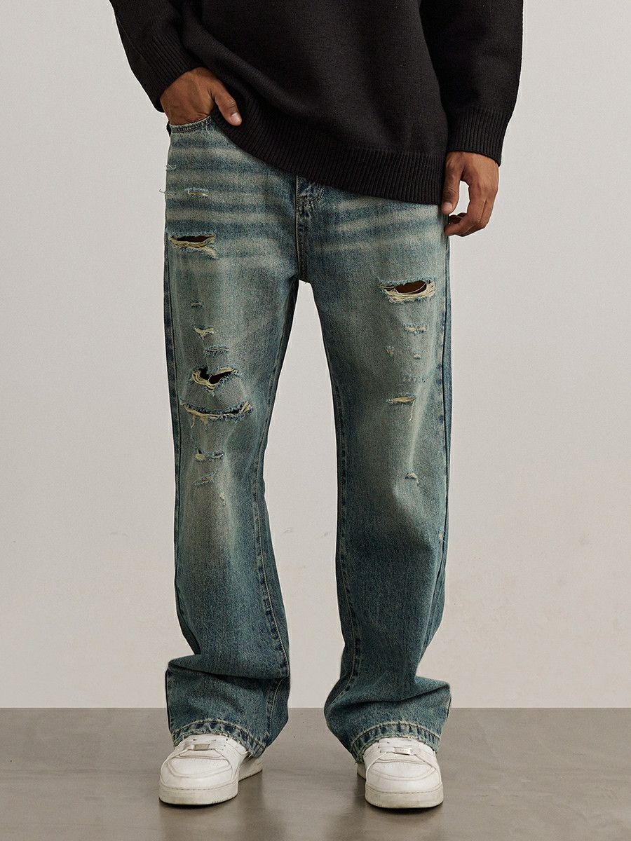 washed faded denim ripped damaged jeans