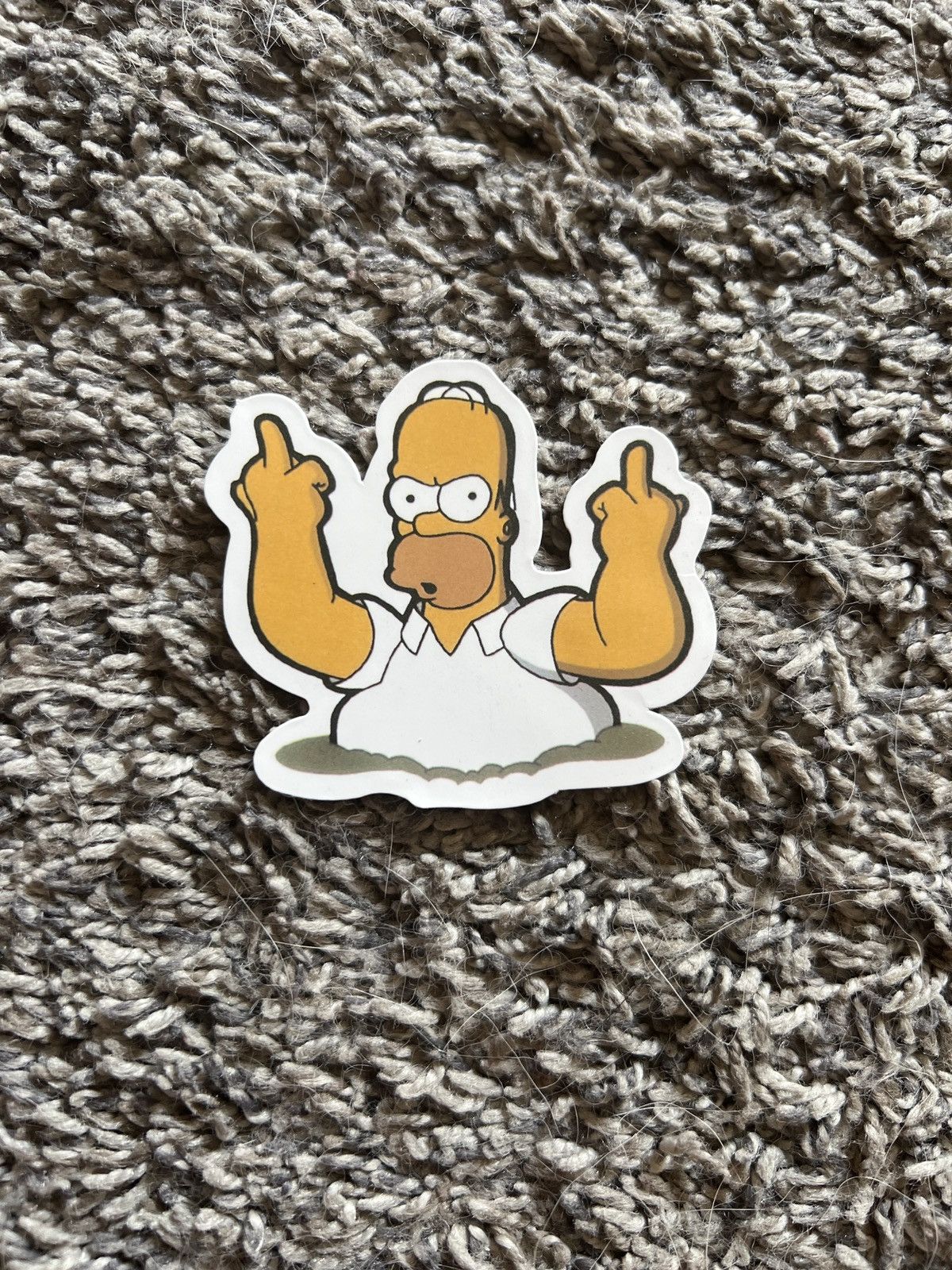 The Simpsons The Simpsons Homer Simpson Giving Middle Fingers Sticker Size ONE SIZE - 1 Thumbnail