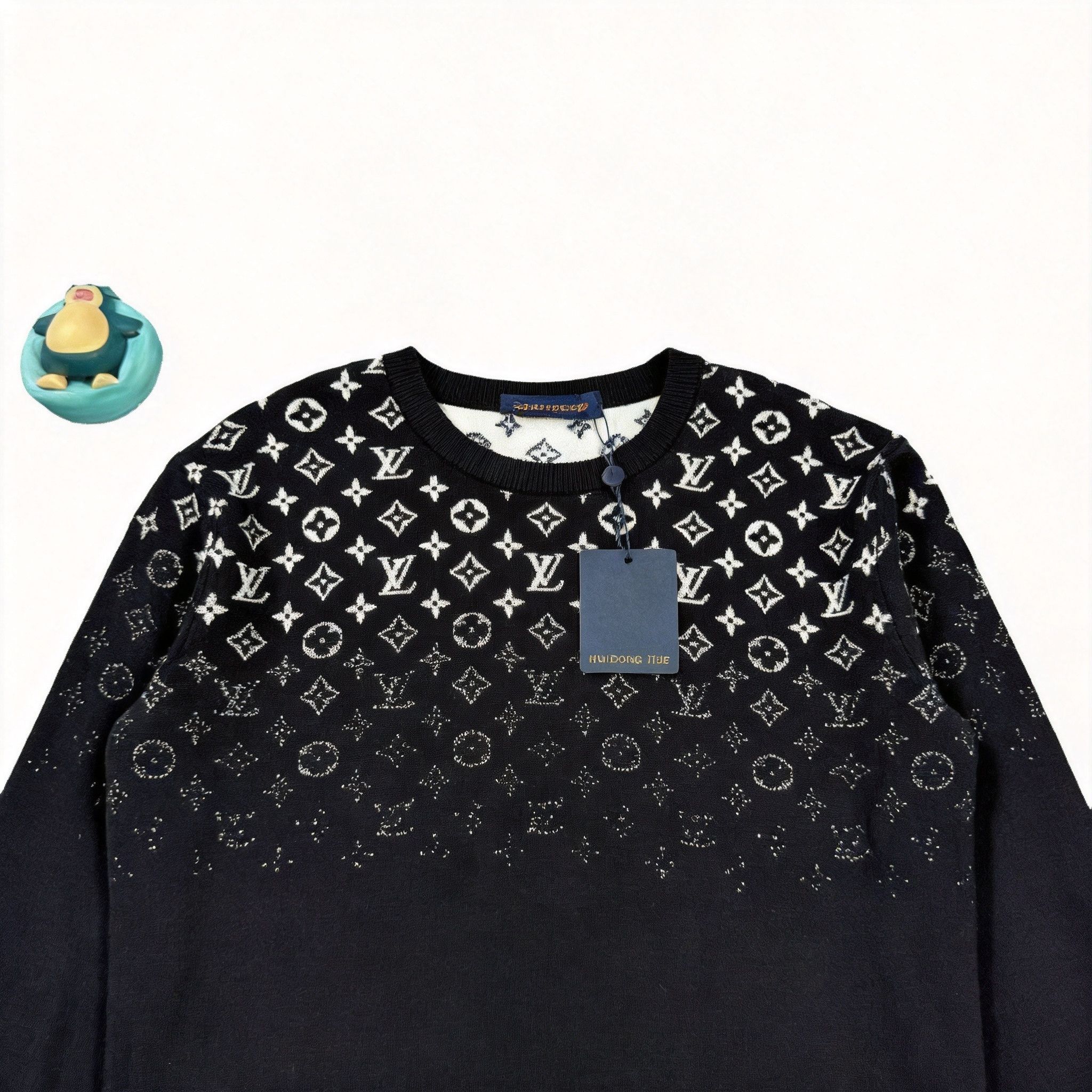 Louis Vuitton Louis Vuitton's latest black NBA knit logo cardigan