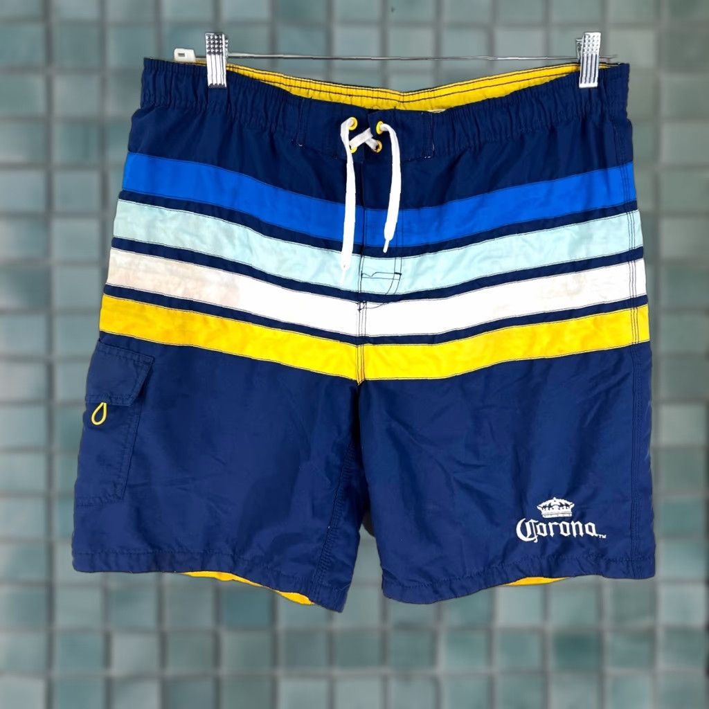 Swims **Corona Bermuda Swim Shorts Mens L Size Blue Yellow Pocket** User: **Corona Bermuda Swim Lined Shorts Mens Size L Blue Yellow Pocket** Size US 33 - 1 Thumbnail