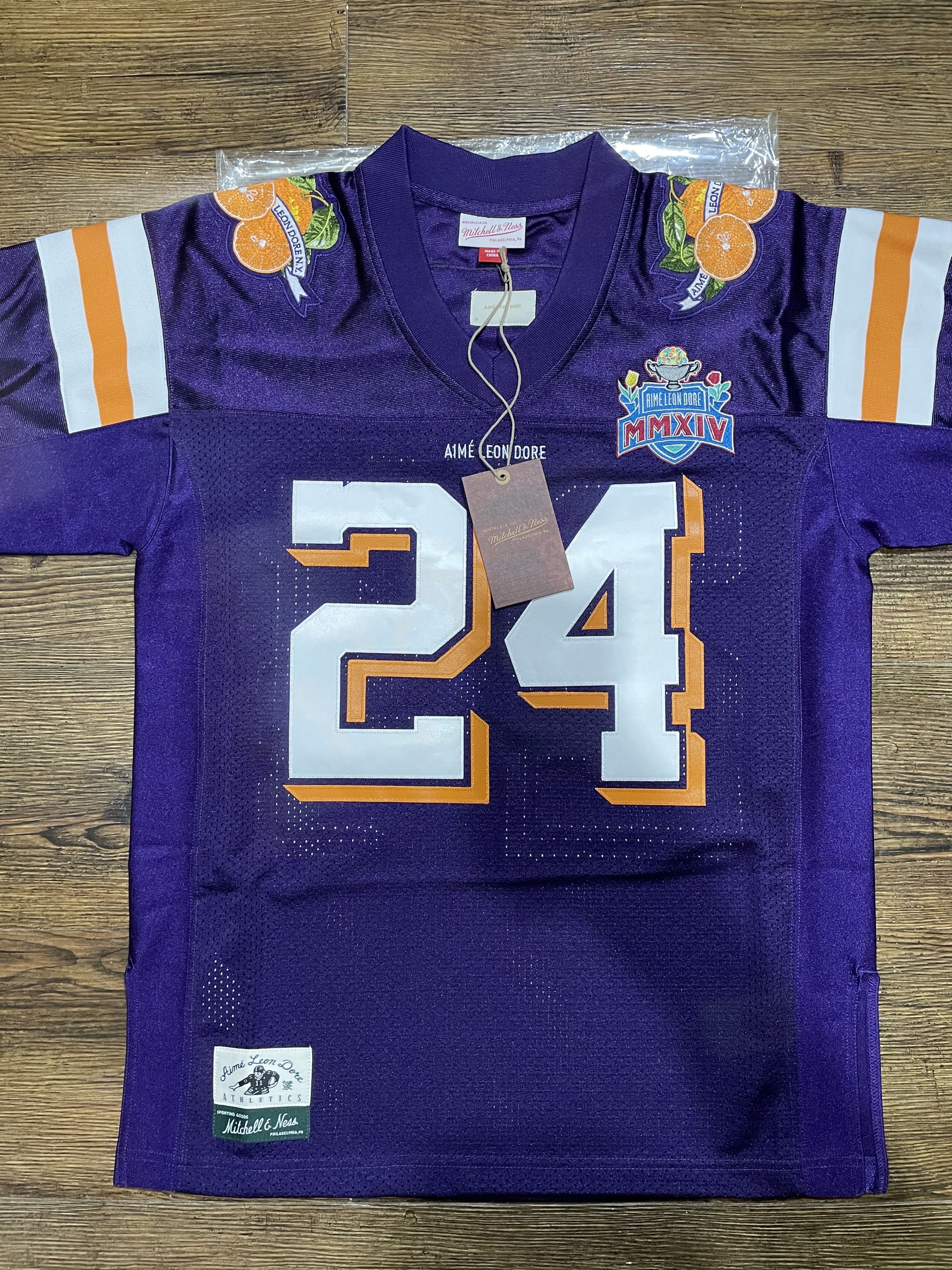 image of Aime Leon Dore Ald / Mitchell & Ness Team Football Jerseya in Parachute Purple, Men's (Size Medium)