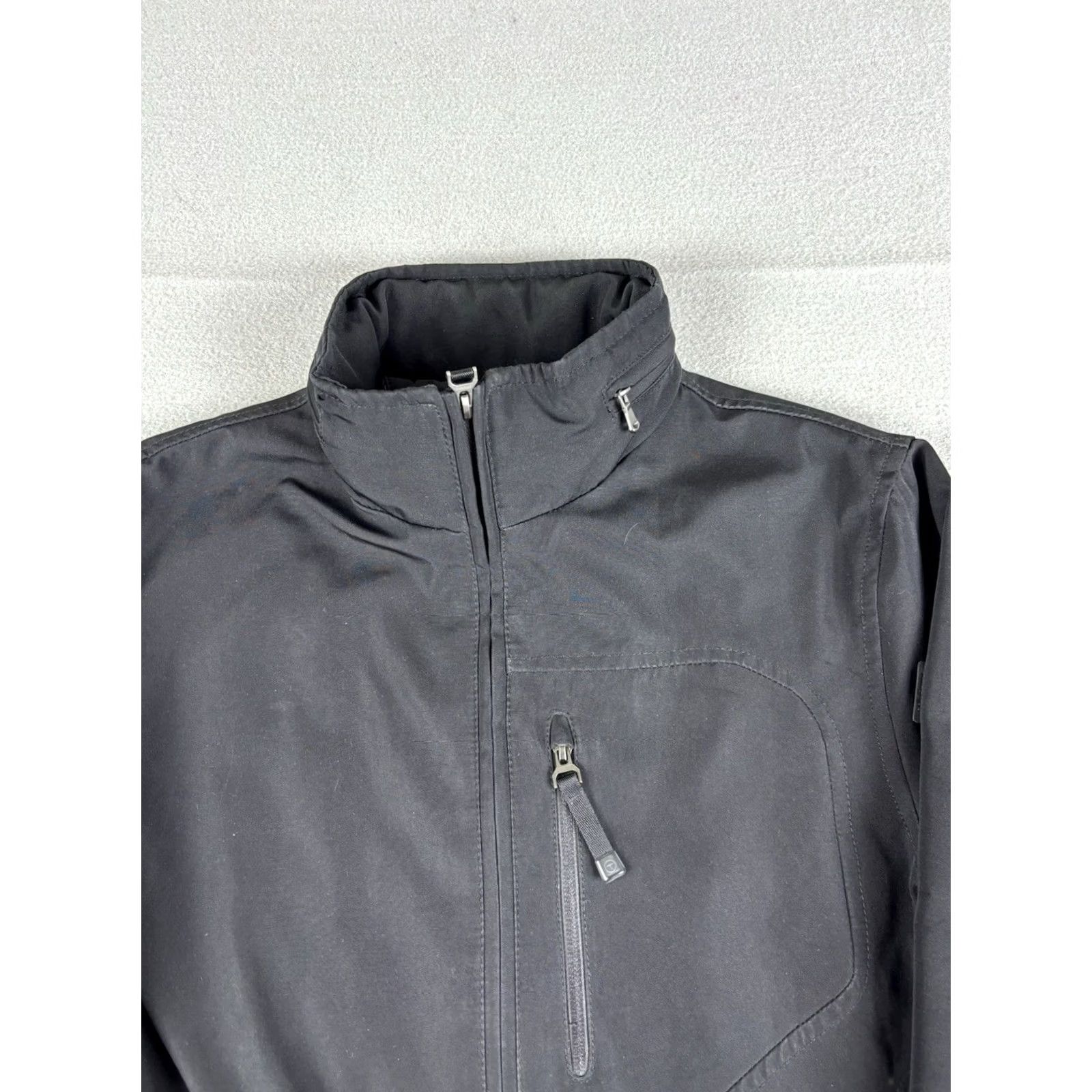 Tumi TUMI Tech Jacket Mens S Black Soft Shell Zip Up Hidden Hood Travel Casual Regular Jacket Size US S / EU 44-46 / 1 - 2 Thumbnail