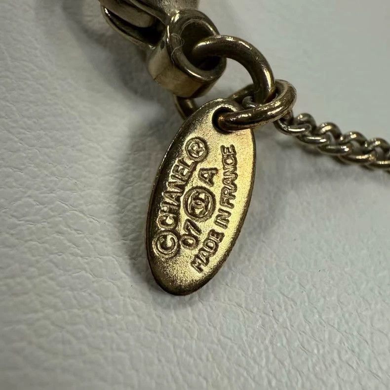 Vintage Chanel Necklace with Logo Design