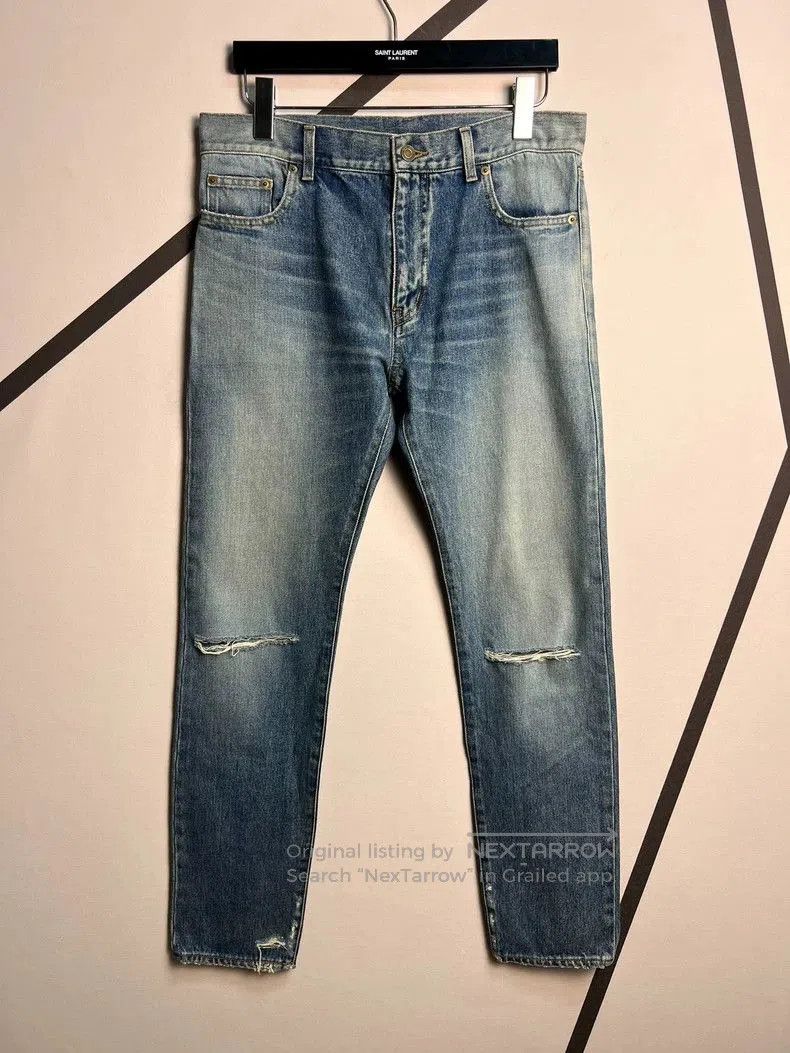 Saint Laurent Washed Blue Distressed Jeans.