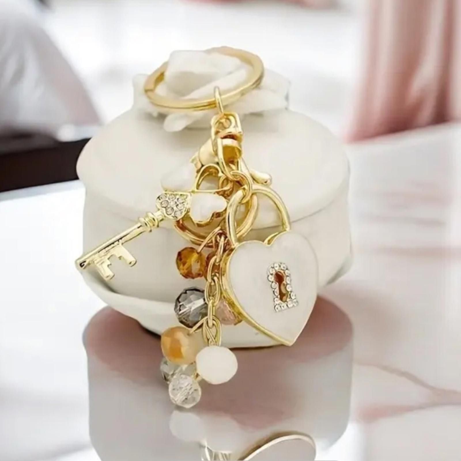 Designer Gold and White Heart Keychain with Charms NWT Size ONE SIZE - 1 Thumbnail