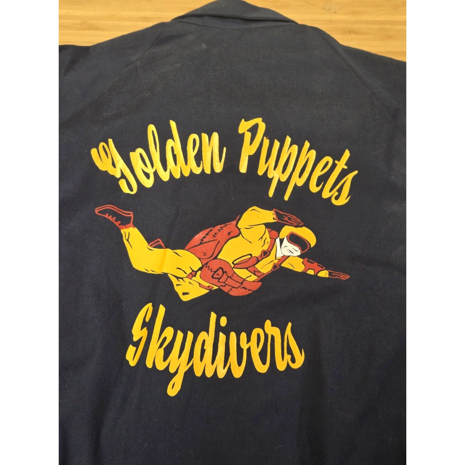 Vintage VINTAGE Printwear Jacket Mens XL Navy Golden Puppets Skydivers Graphic Cotton Size US XL / EU 56 / 4 - 2 Thumbnail