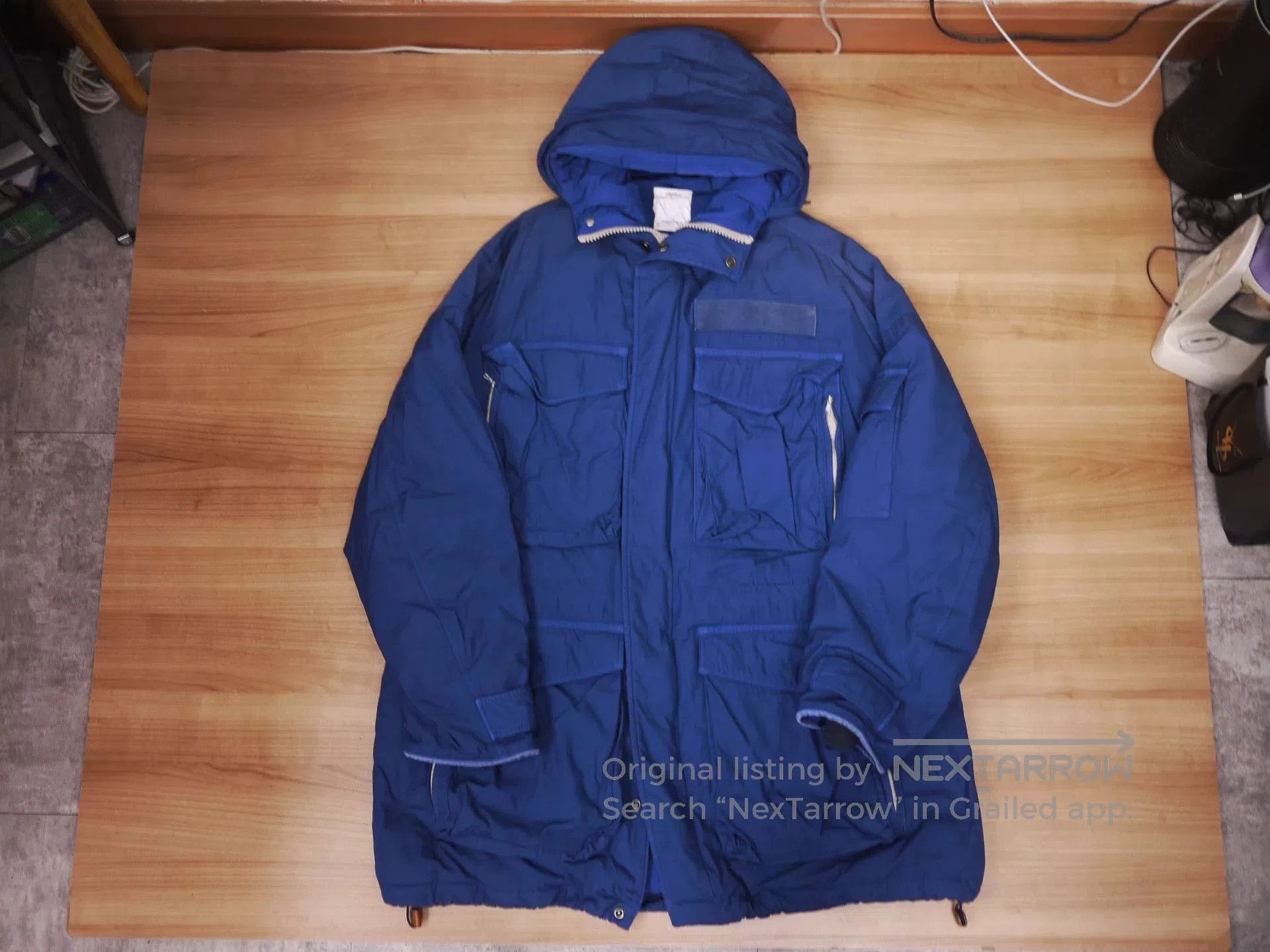 visvim krupa field down jacket in blue.