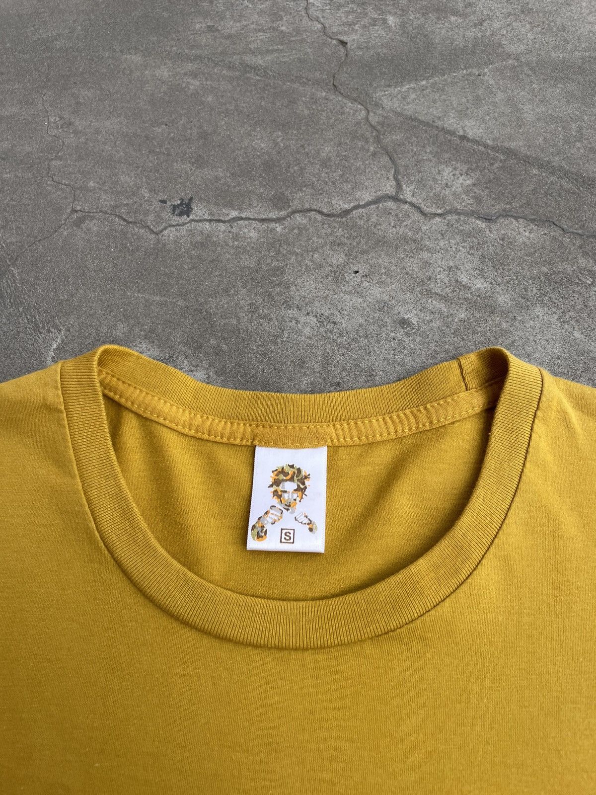 Other Banksy, Flower Thrower (2003) Slim Mustard T-Shirt Size US S / EU 44-46 / 1 - 2 Thumbnail